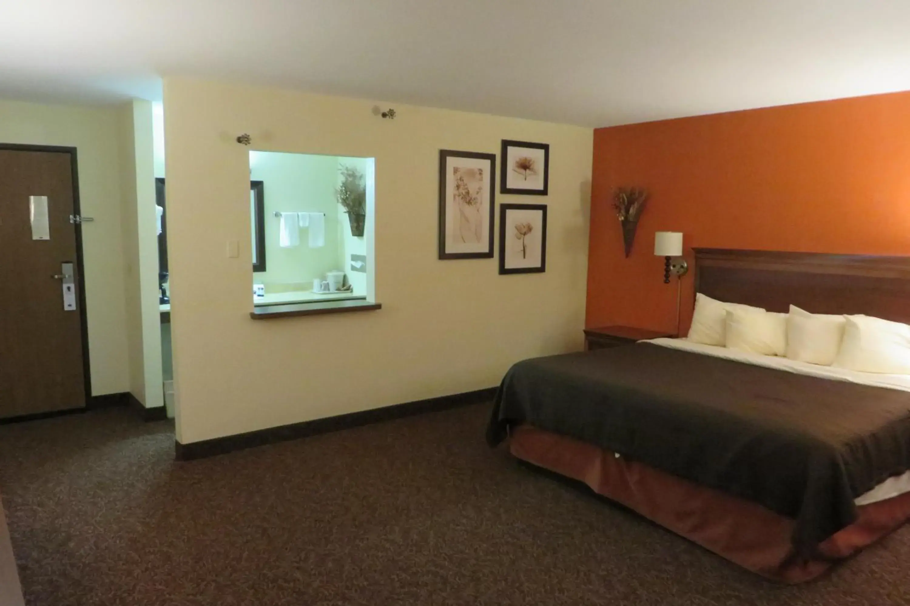 Bed in AmericInn by Wyndham Forest Lake Bed in AmericInn by Wyndham Forest Lake