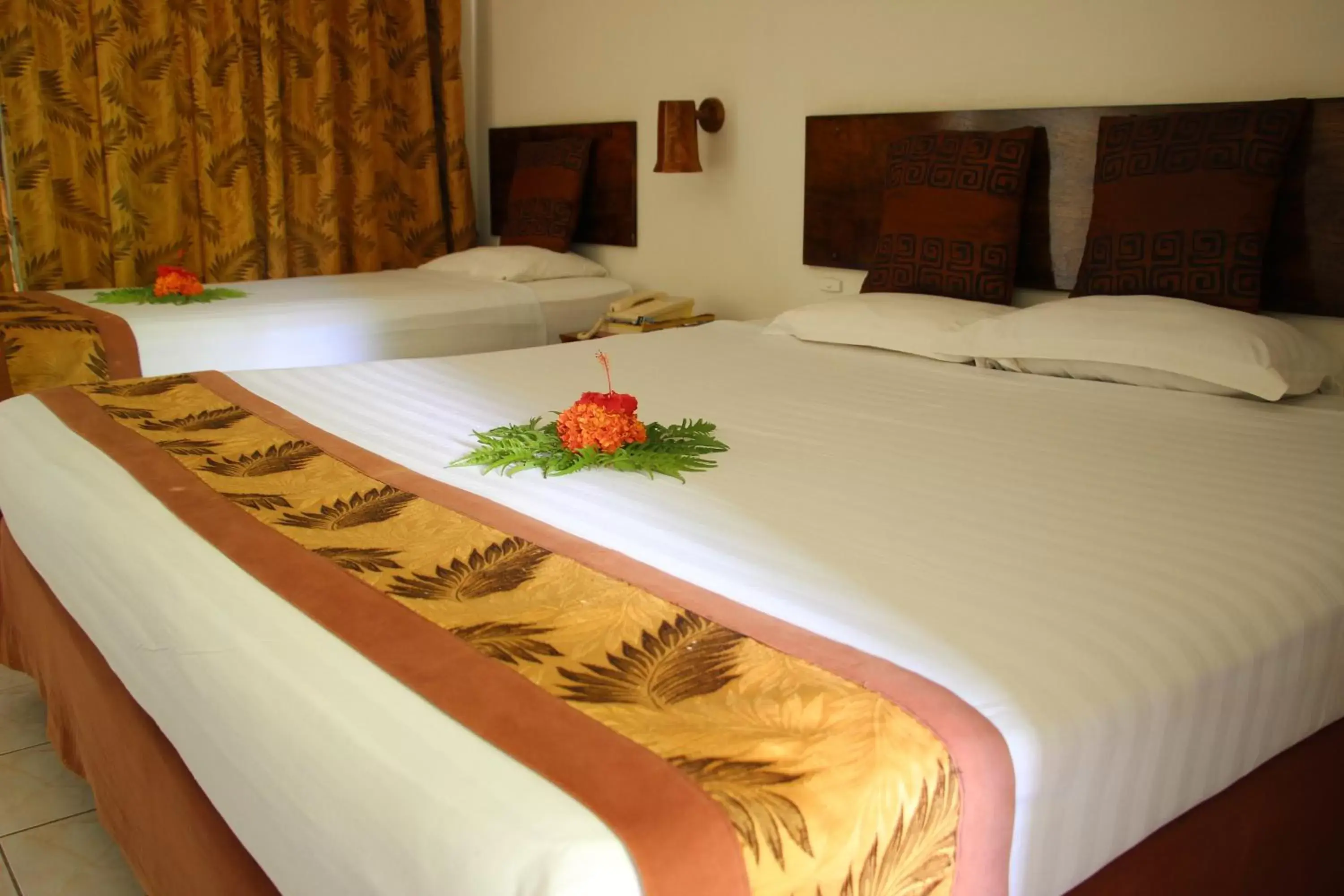 Bed in Capricorn International Hotel