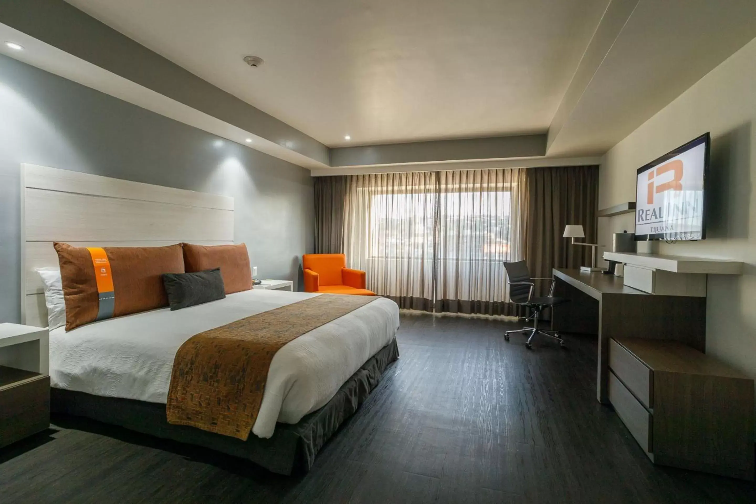 Bedroom in Real Inn Tijuana by Camino Real Hotels