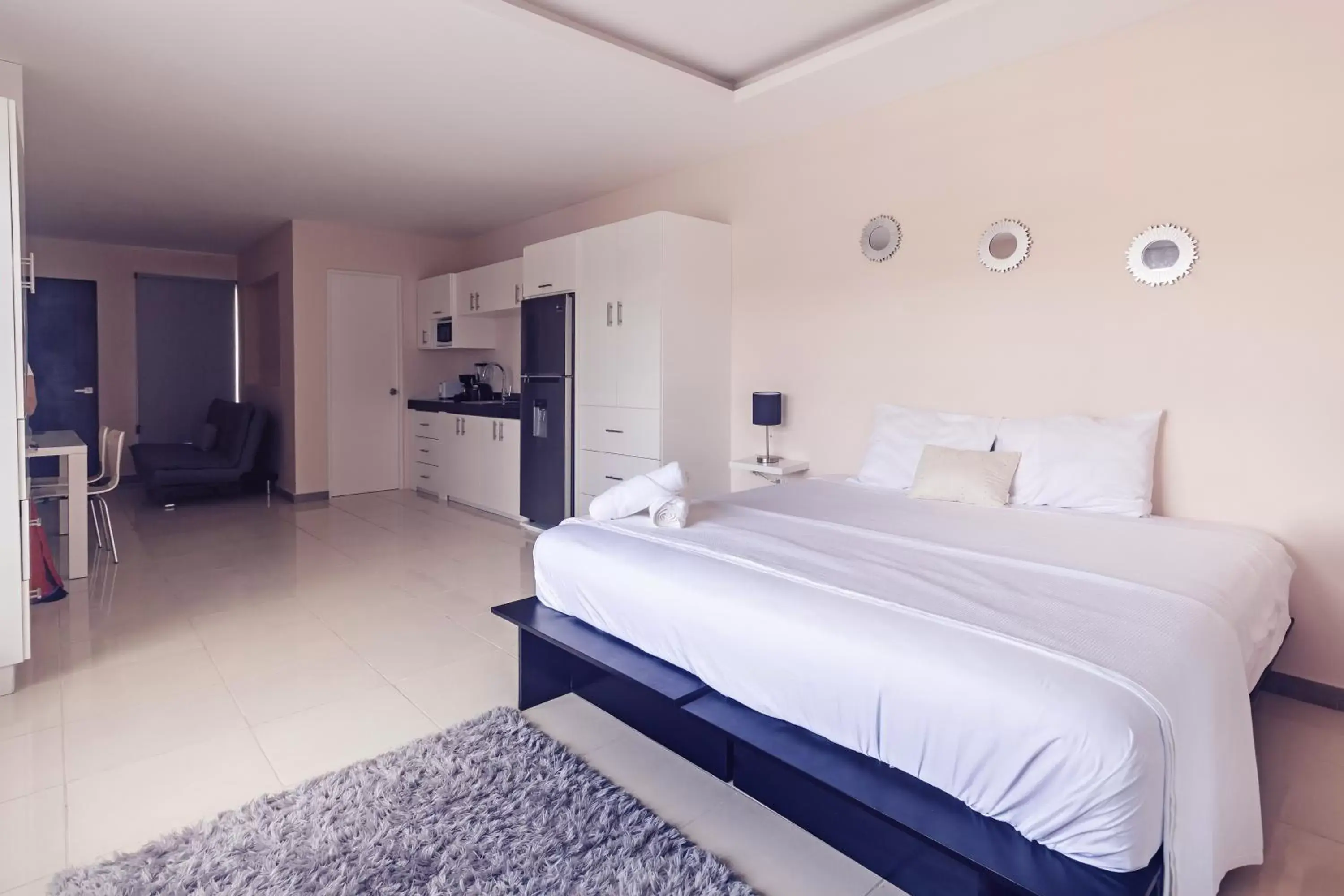 Kitchen or kitchenette, Bed in Hotel CARPE DIEM Tulum by Nah Hotels