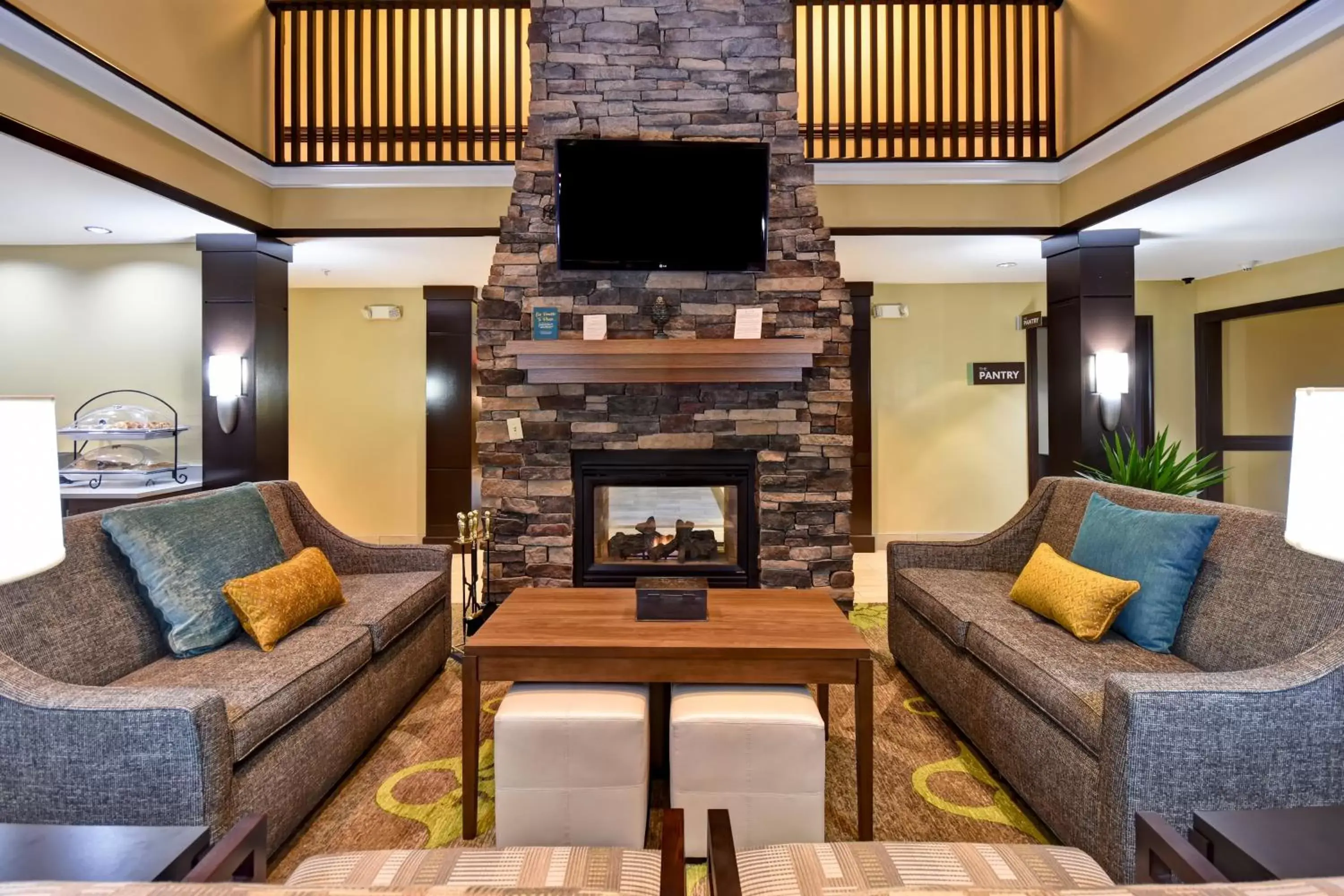 Property building, Seating Area in Staybridge Suites Grand Rapids-Kentwood, an IHG Hotel