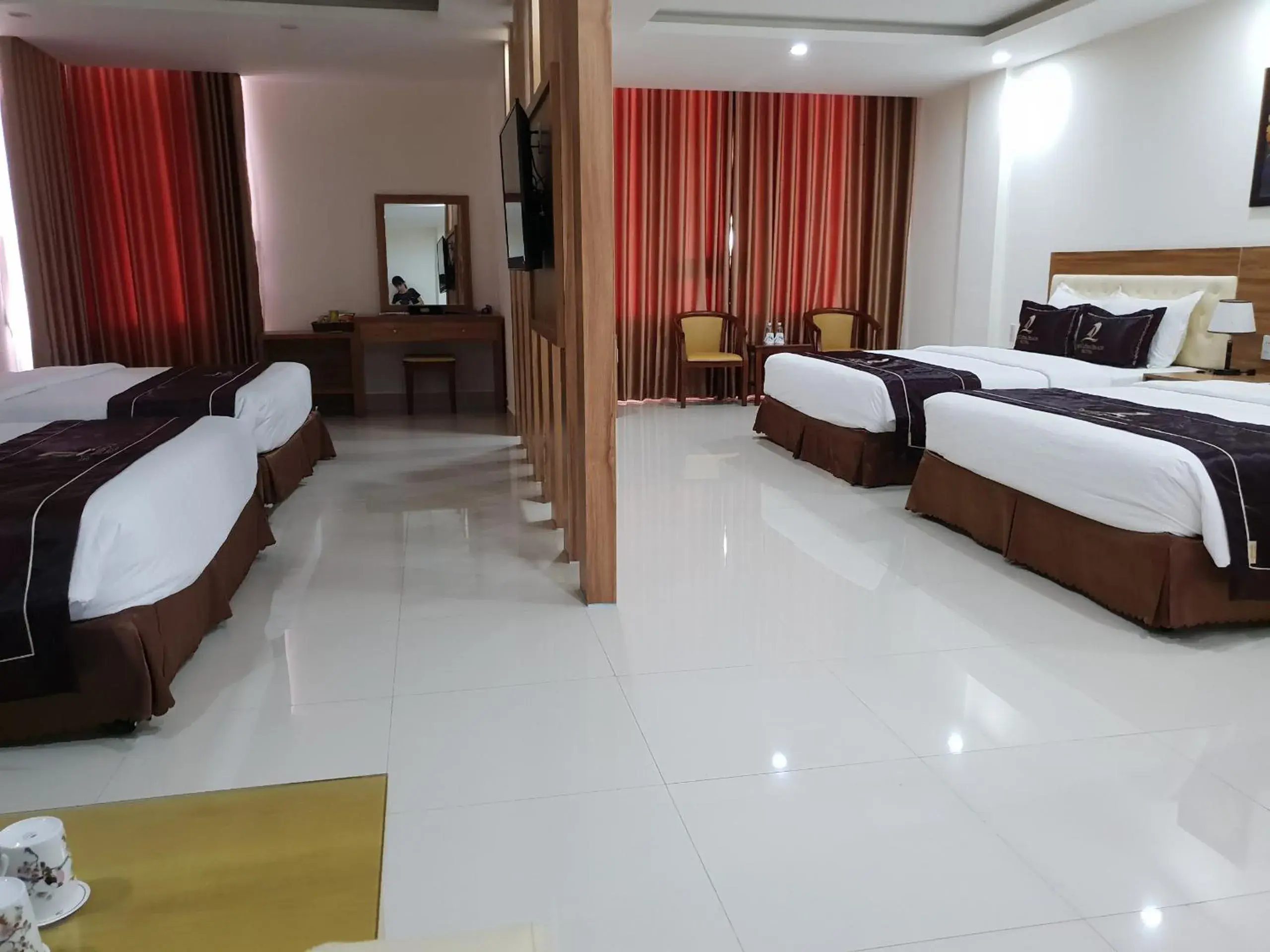 Bed in Phu Cuong Beach Hotel