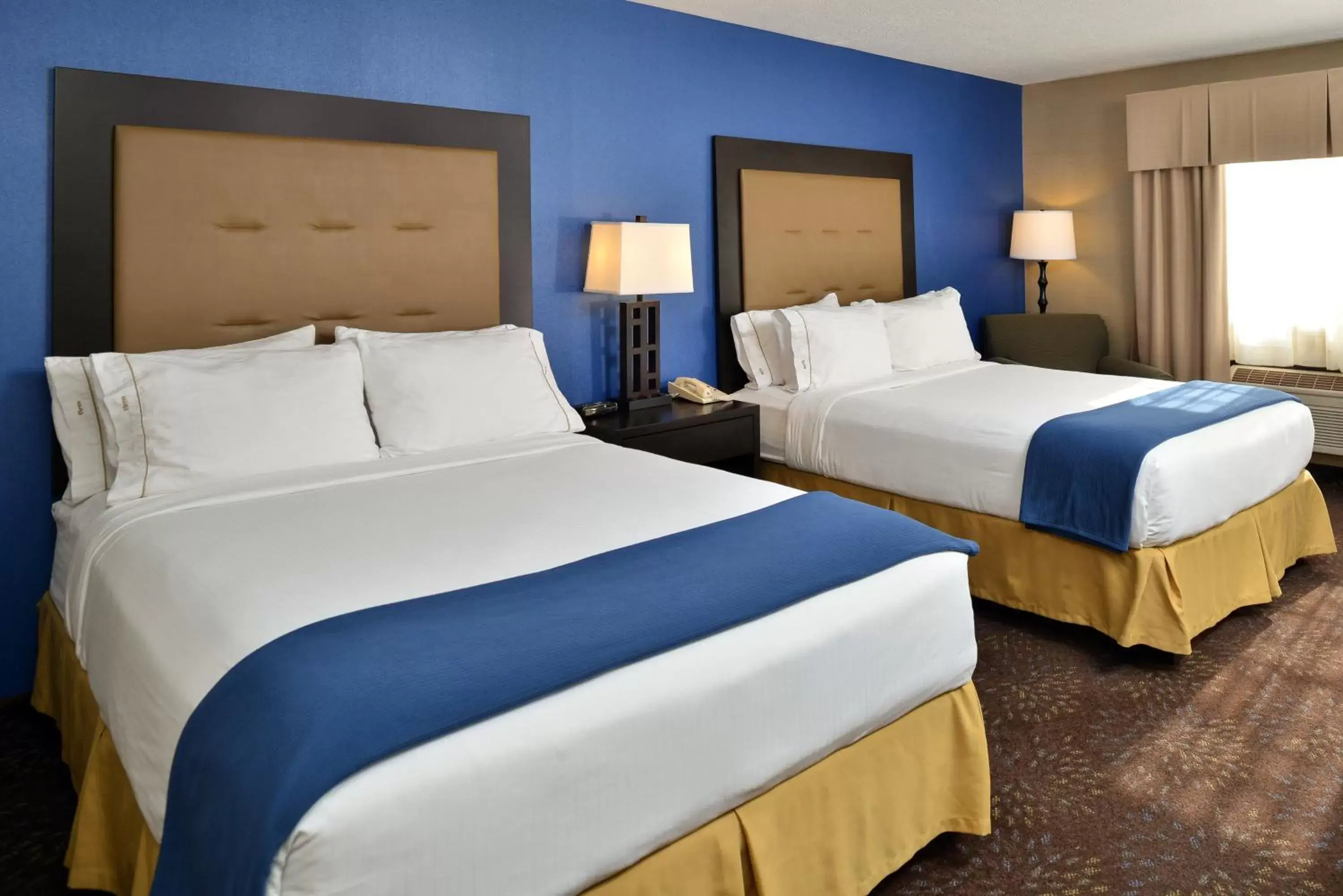 Photo of the whole room, Bed in Holiday Inn Express Hotel & Suites Charlotte, an IHG Hotel