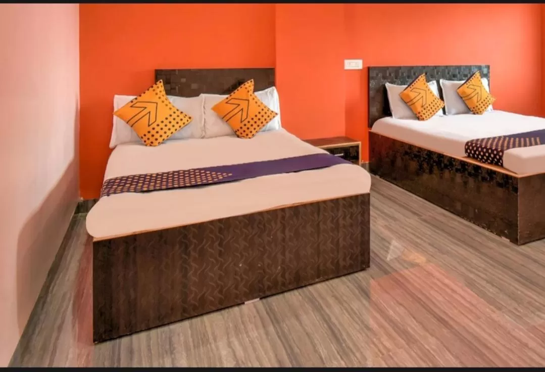 Bed in Hotel Nisarg Lodging And Restaurant