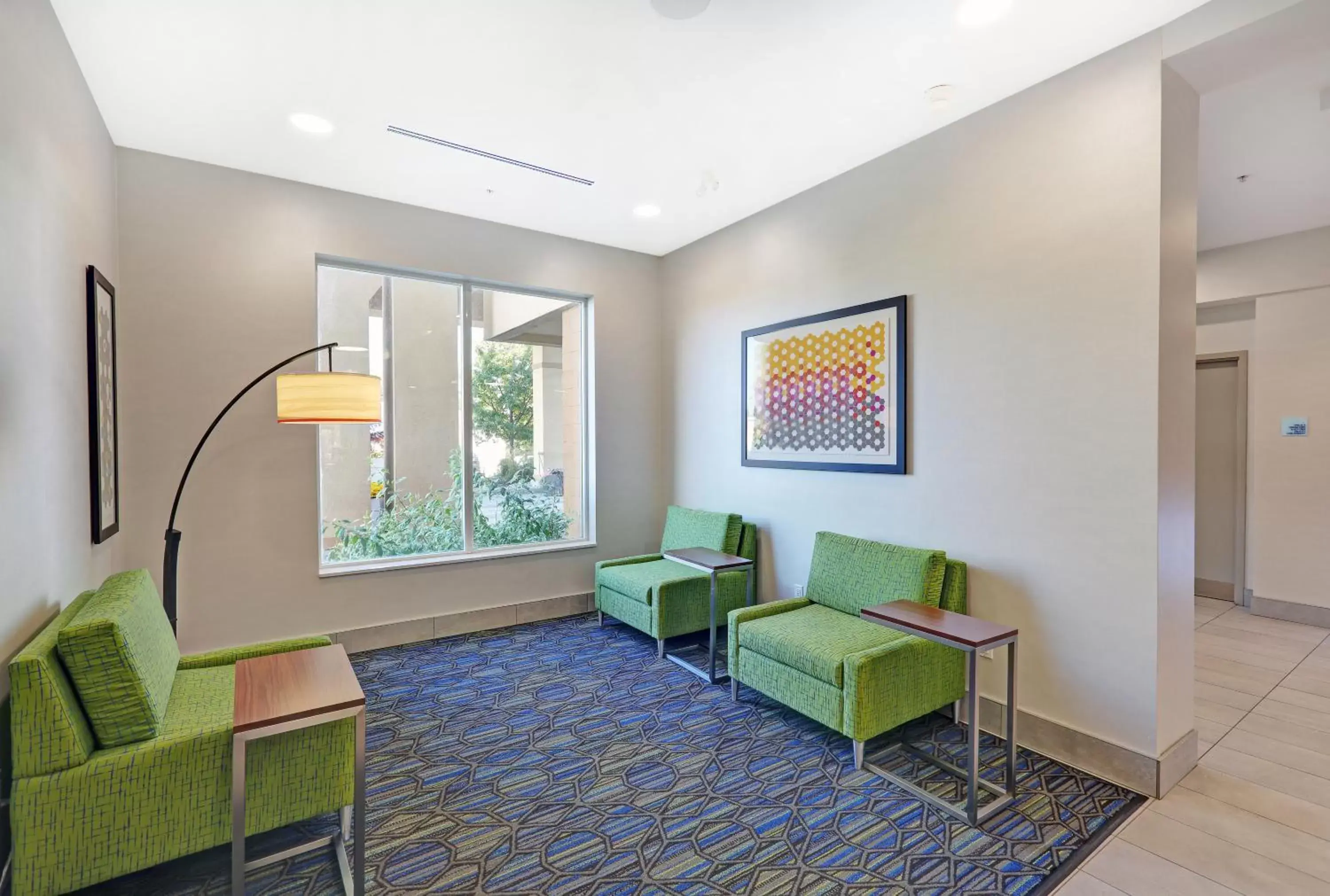 Property building, Seating Area in Holiday Inn Express Hotel & Suites - Woodstock, an IHG Hotel