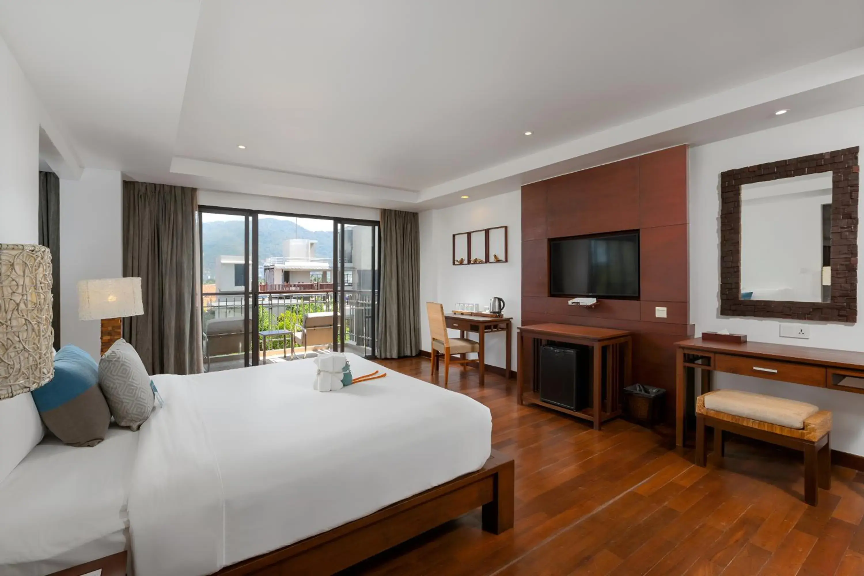 Bed in Baan Laimai Beach Resort & Spa - SHA Extra Plus Bed in Baan Laimai Beach Resort & Spa - SHA Extra Plus