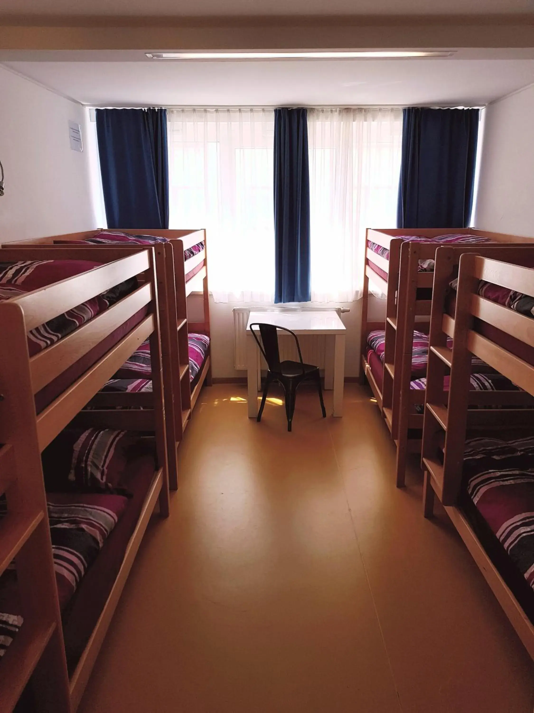Bed in 8-Bed Mixed Dormitory Room in a&t Holiday Hostel