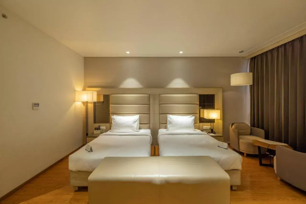 Bedroom, Bed in Sarovar Portico Morbi