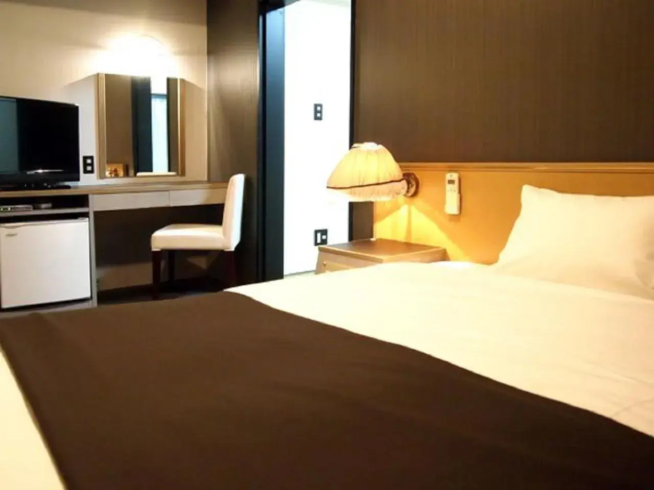 Bed in HOTEL LiVEMAX Osaka Namba