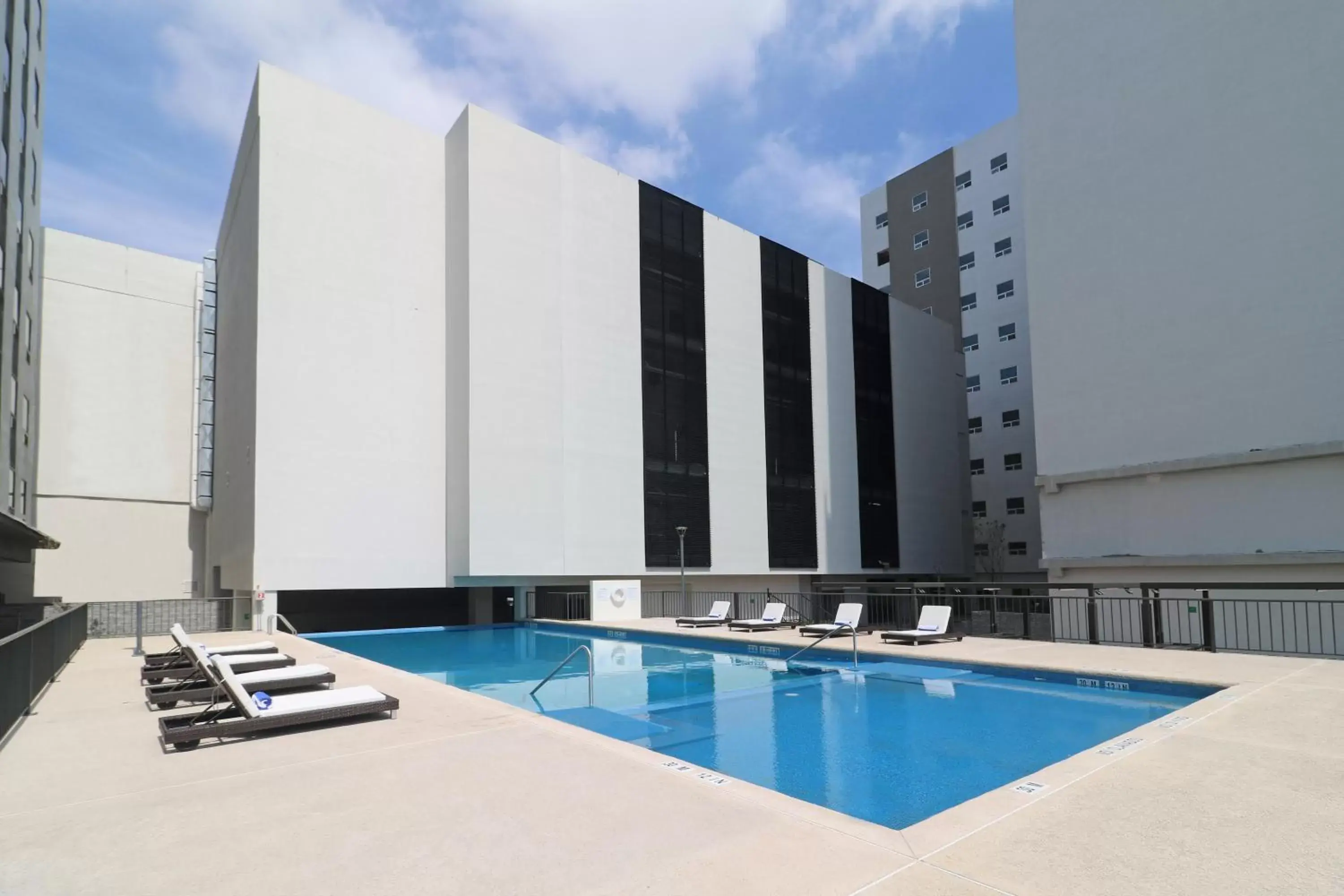 Swimming Pool in Holiday Inn & Suites - Monterrey Apodaca Zona Airport, an IHG Hotel