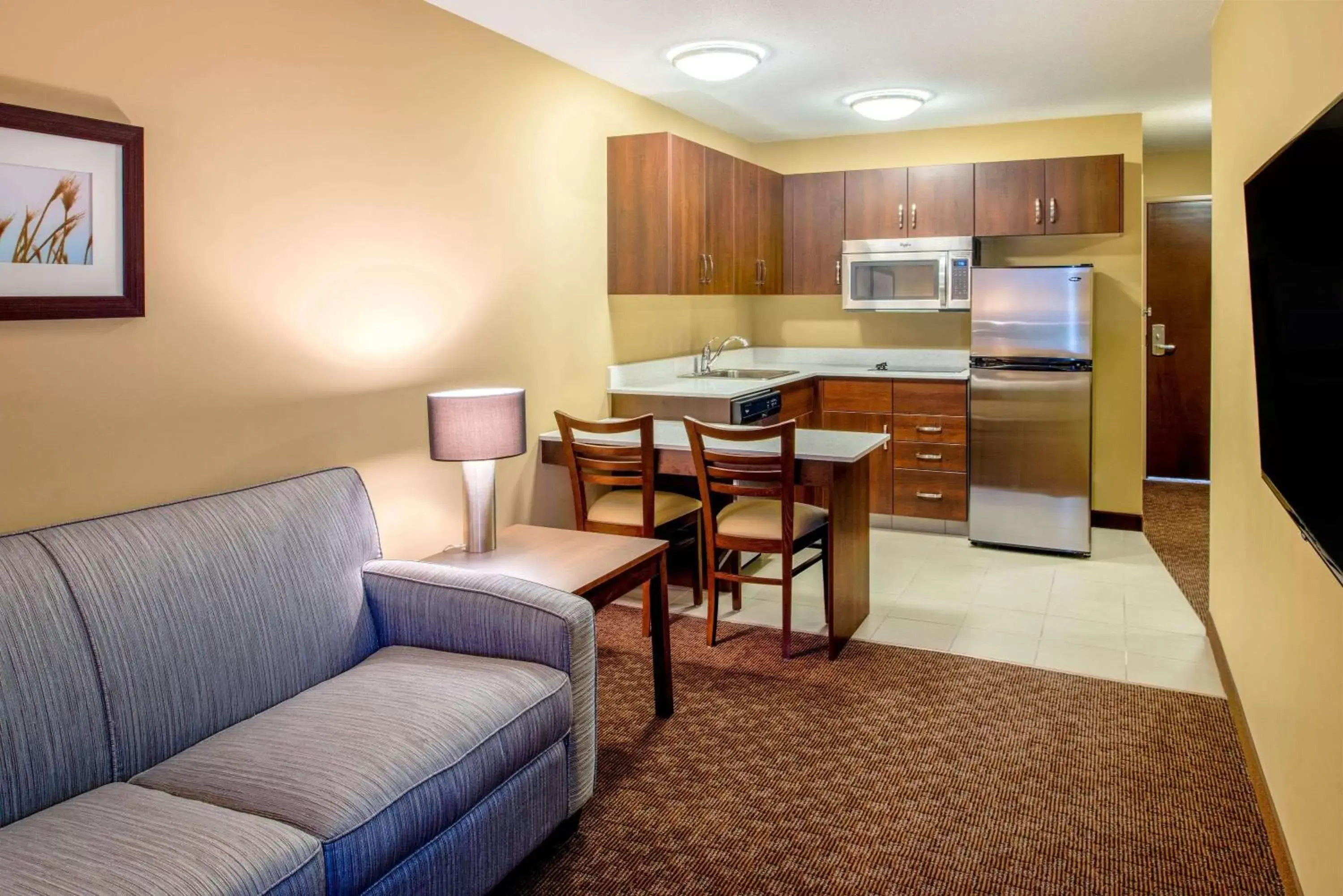 Photo of the whole room, Seating Area in Microtel Inn & Suites by Wyndham Red Deer