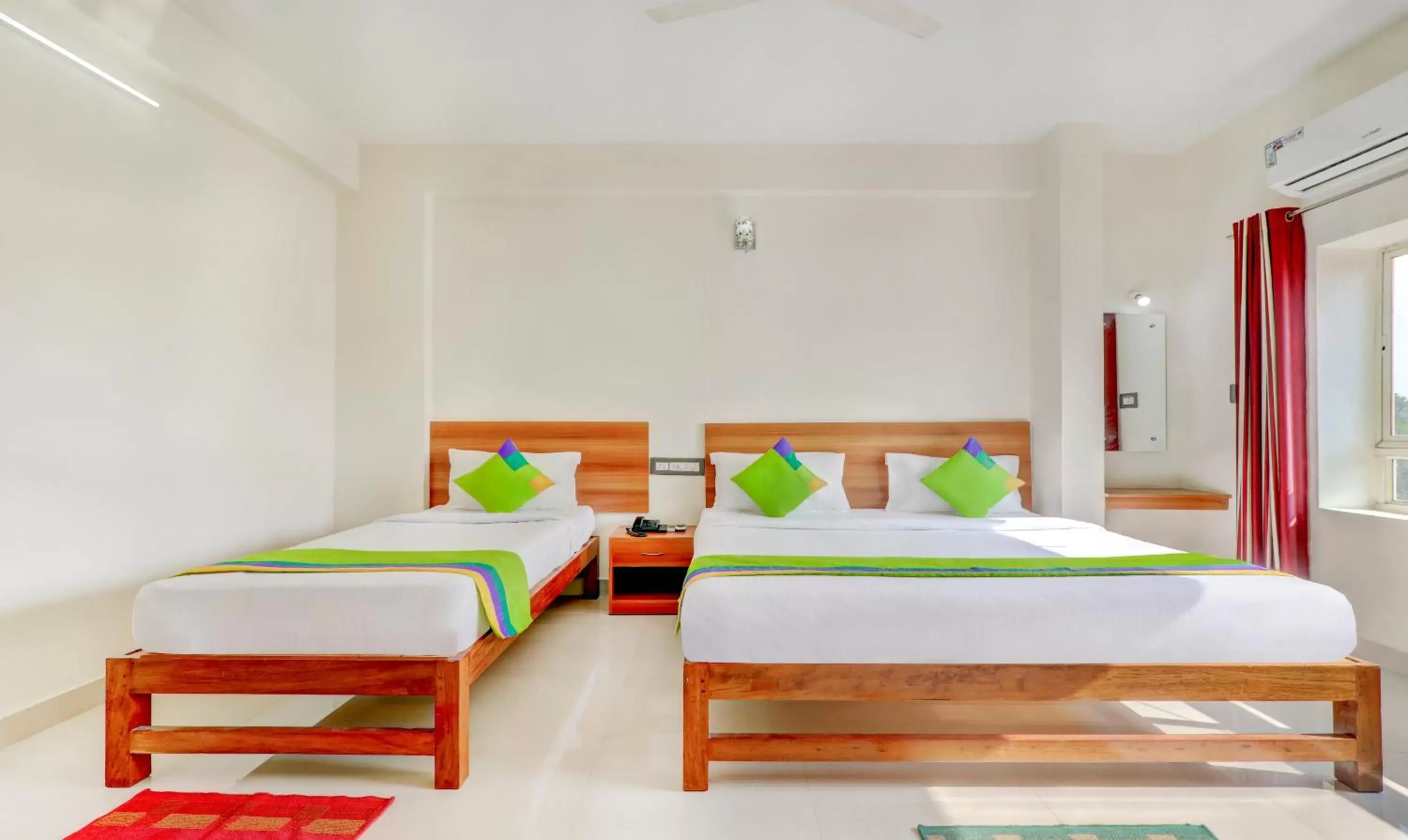 Bedroom, Bed in Treebo Atithi Comforts, 1 Km From Nisargadhama Forest Bedroom, Bed in Treebo Atithi Comforts, 1 Km From Nisargadhama Forest