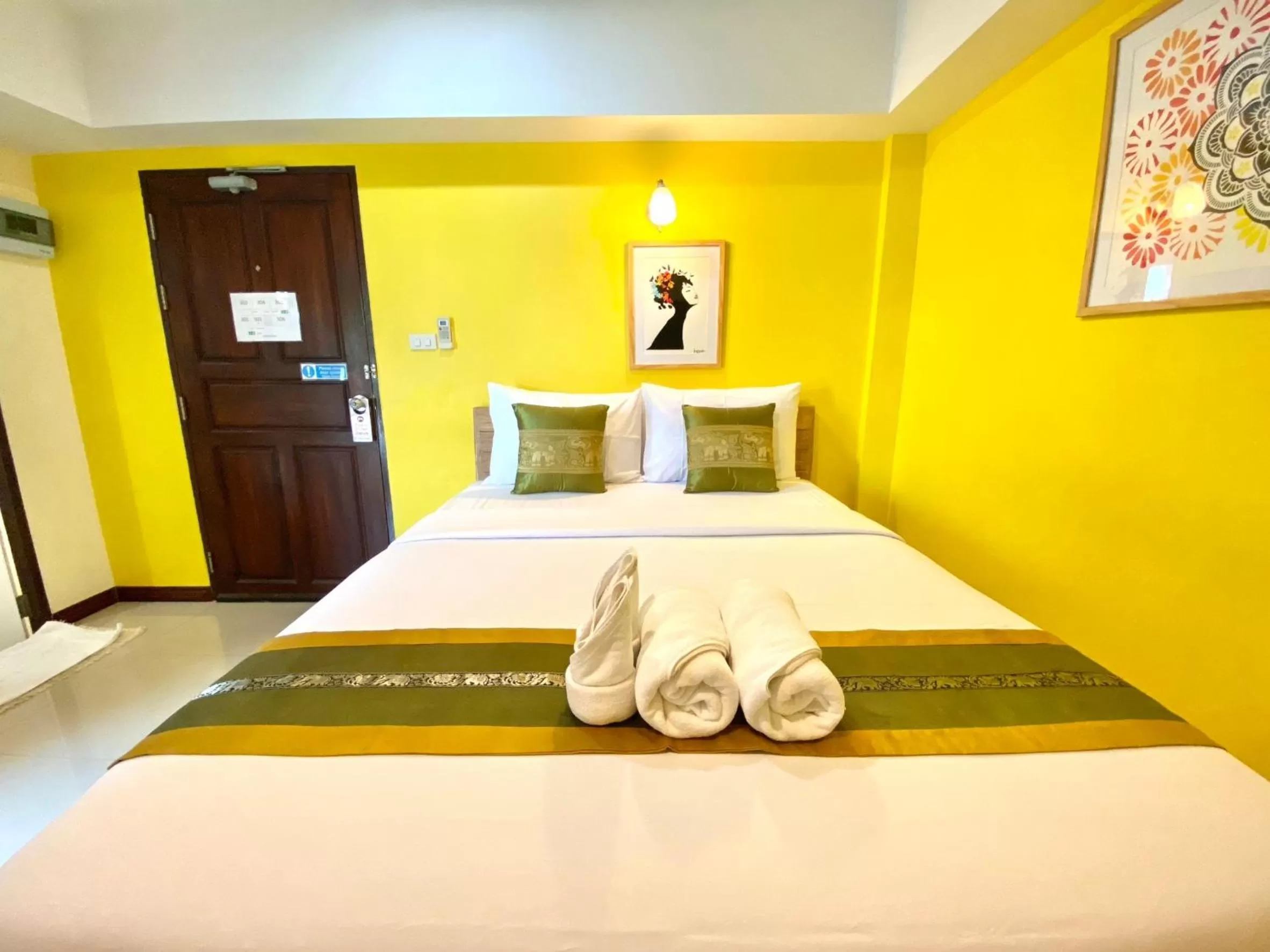Bed in Chinda Boutique Hotel