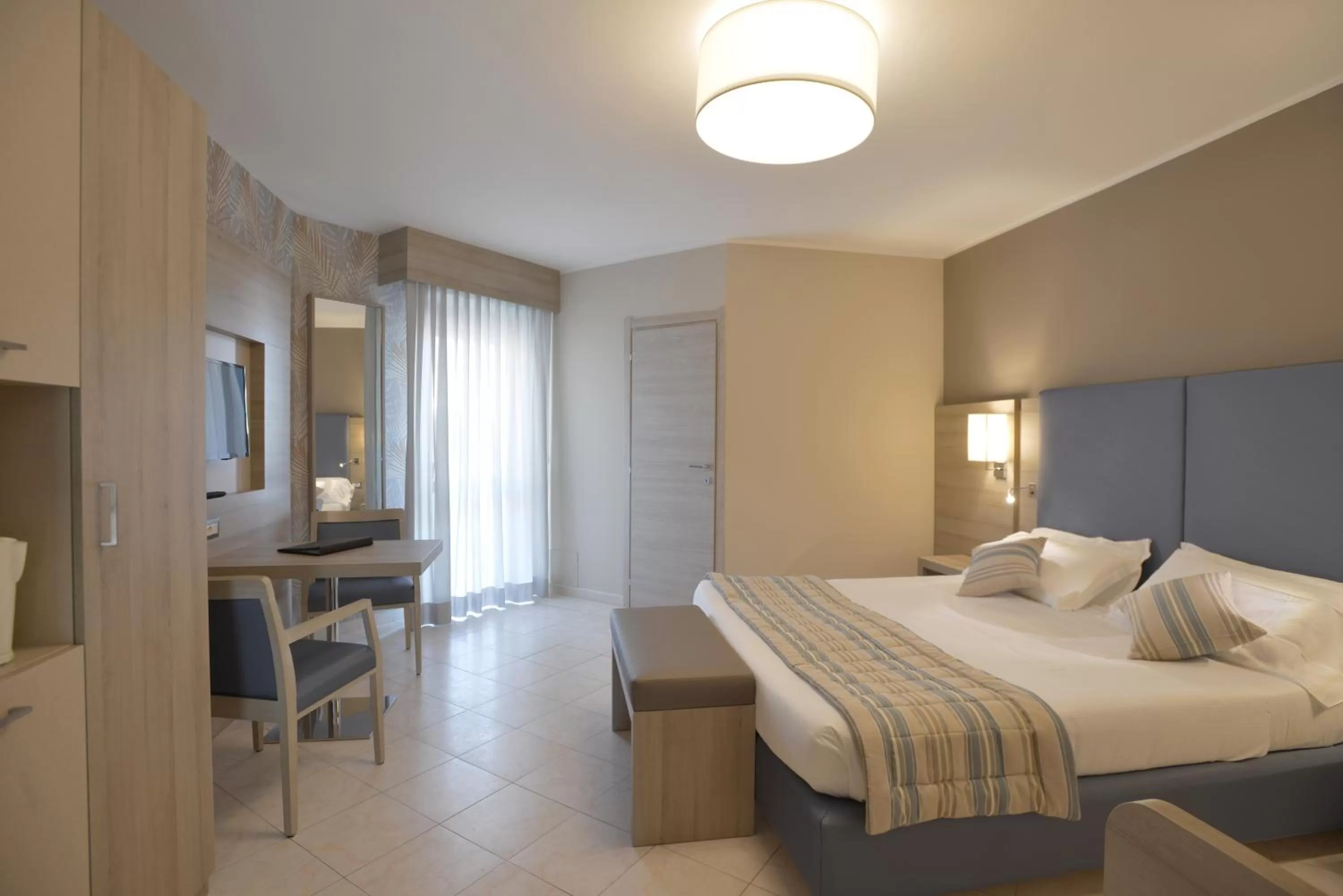 Photo of the whole room, Bed in Alma di Alghero Hotel