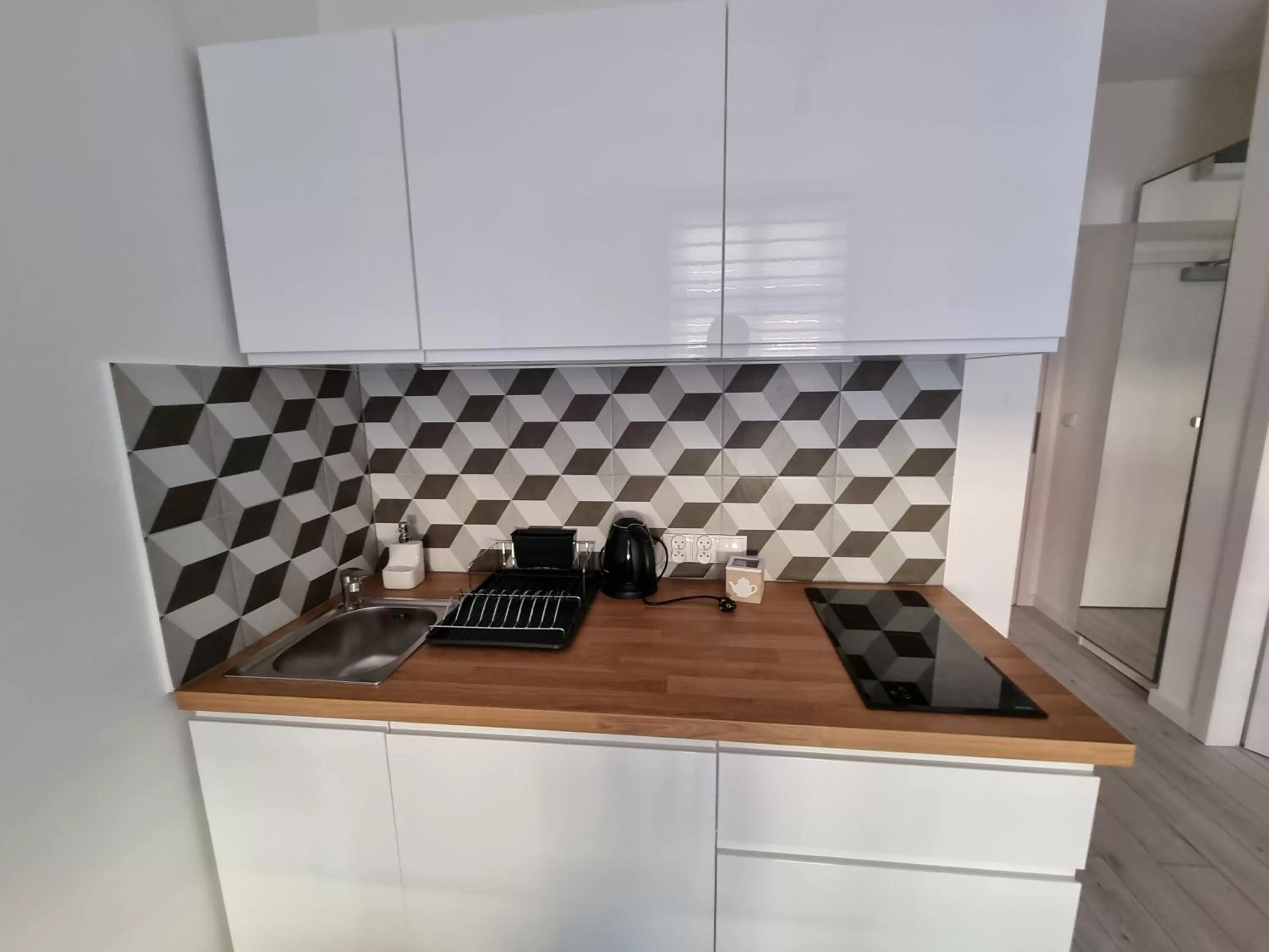 Kitchen or kitchenette in Apartamenty Katowice Stawowa 5