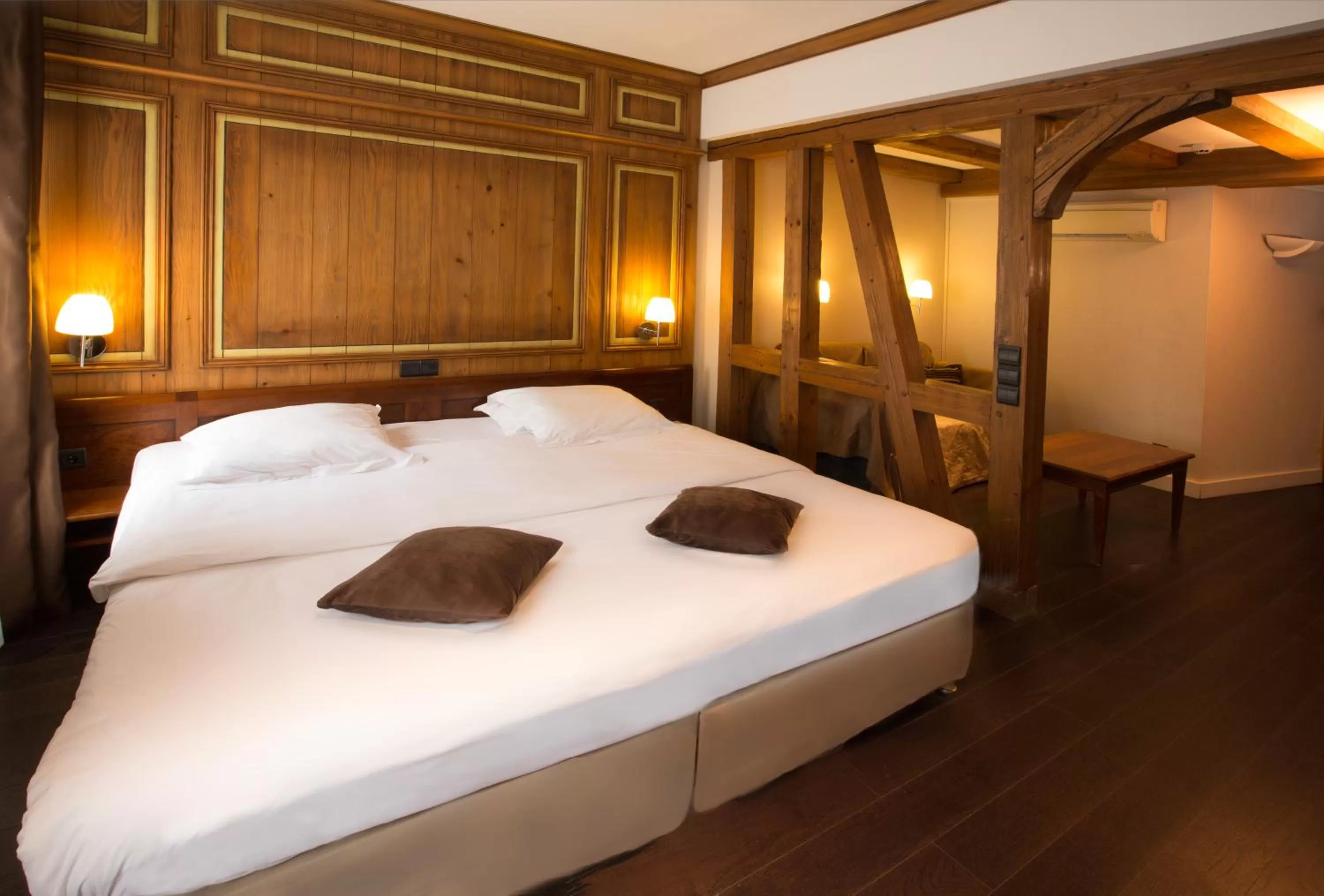 Photo of the whole room, Bed in Hôtel de l'Europe by HappyCulture