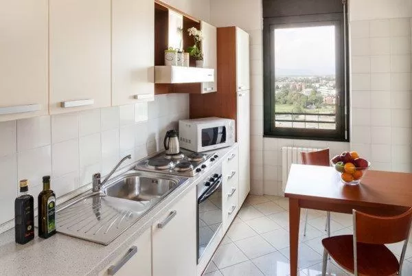 Kitchen or kitchenette in Cosmo Hotel Torri
