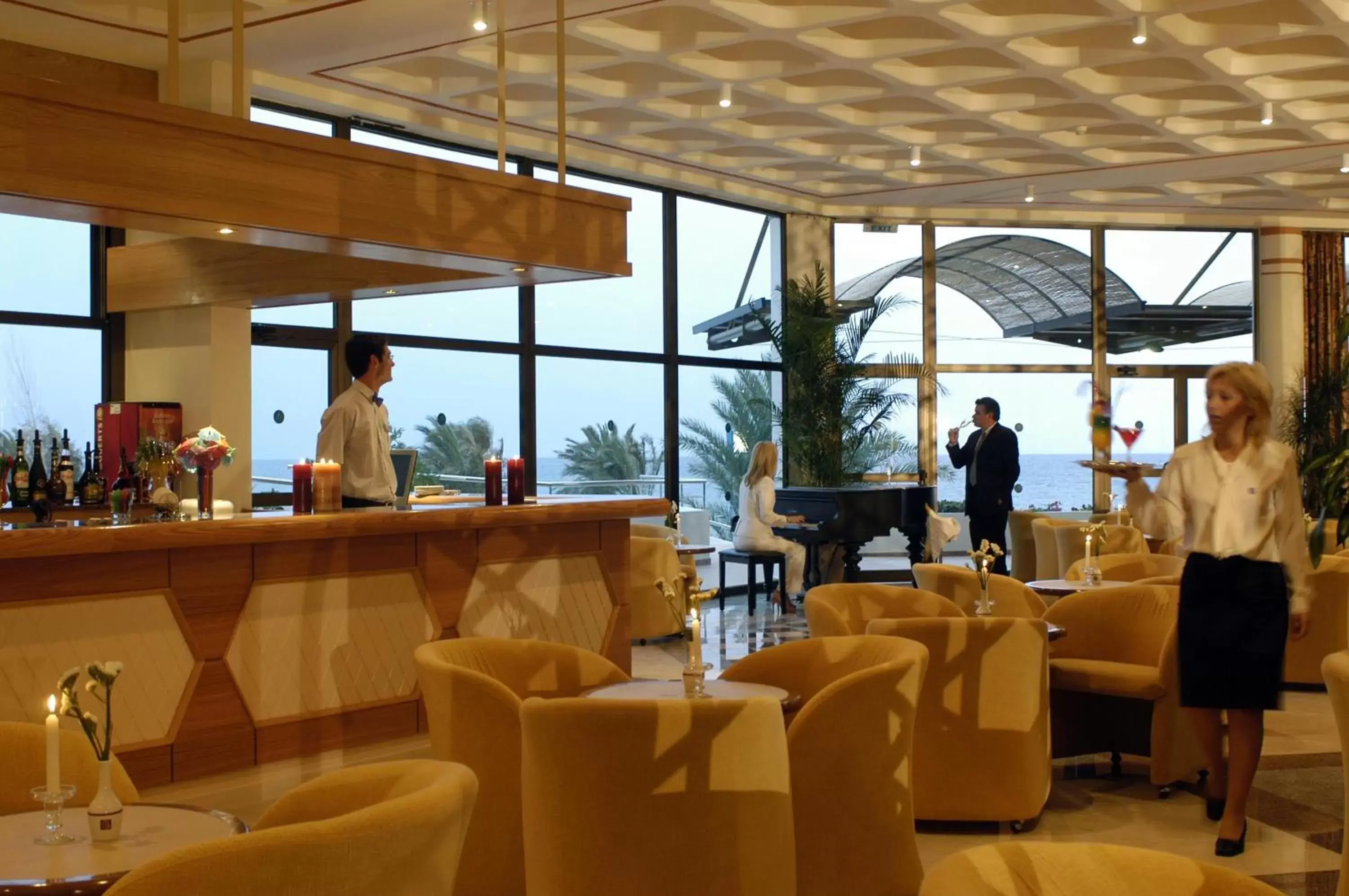 Lounge or bar in Constantinou Bros Athena Royal Beach Hotel