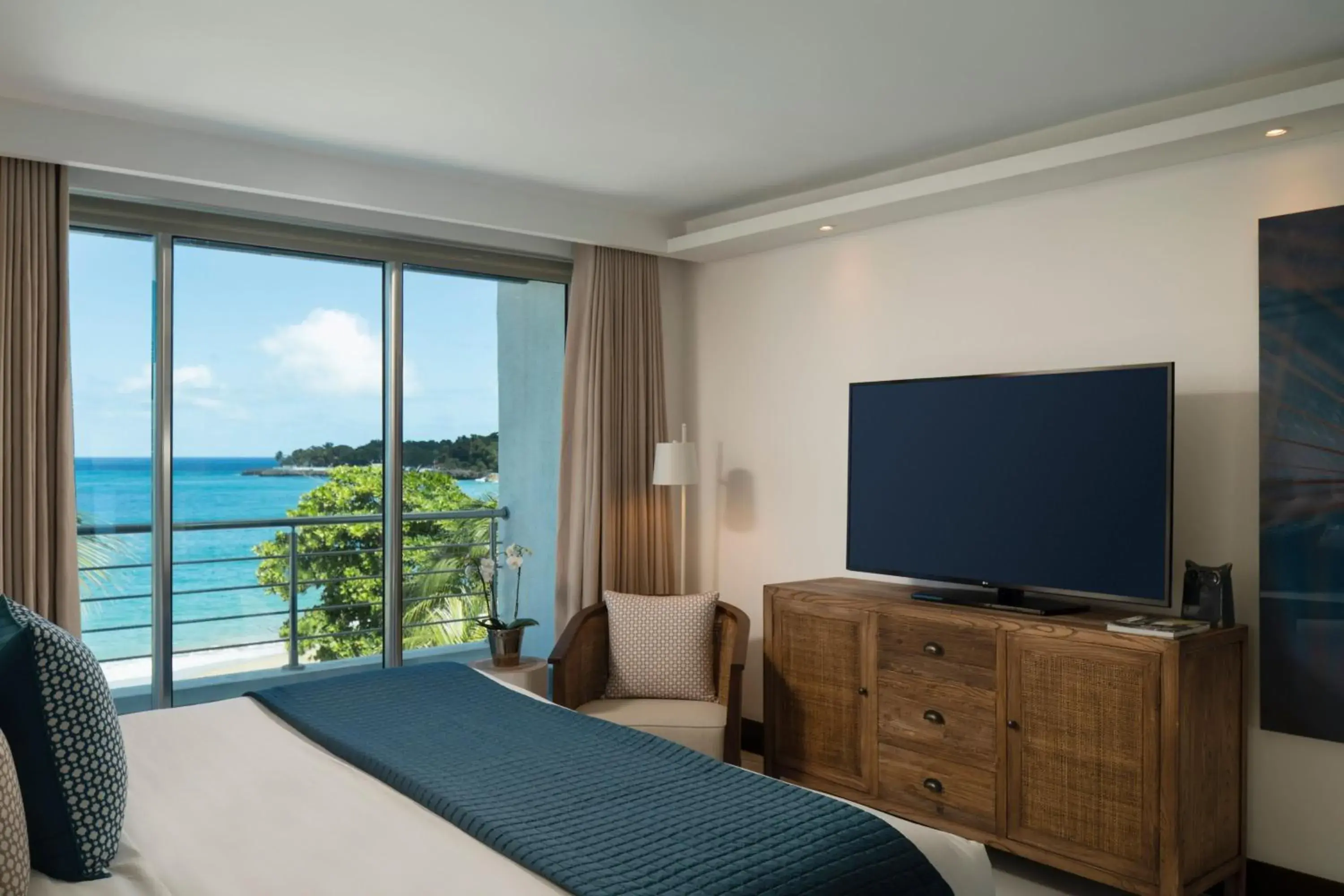 Bedroom, TV/Entertainment Center in The Ocean Club, a Luxury Collection Resort, Costa Norte