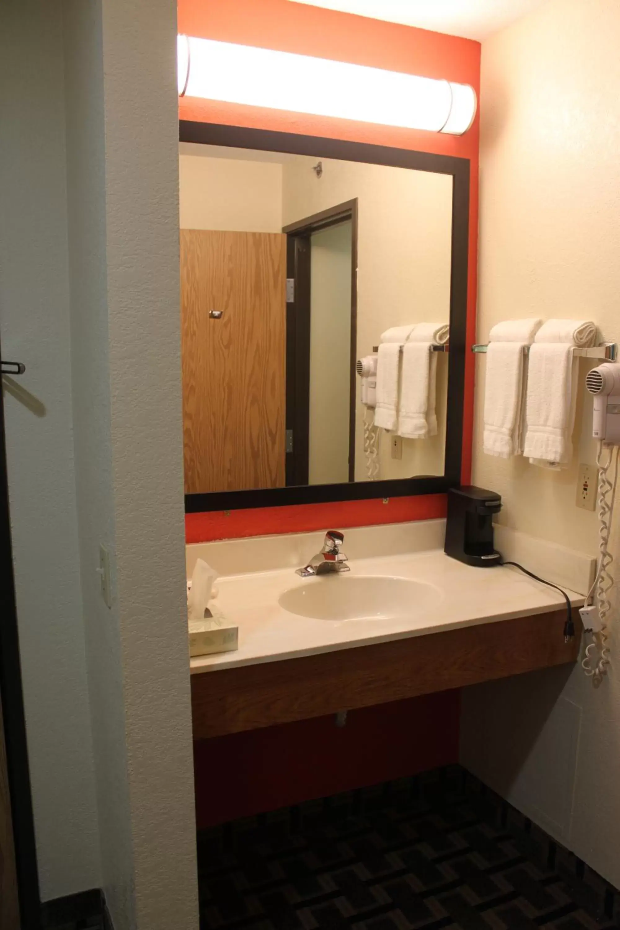 Bathroom in AmericInn by Wyndham West Burlington