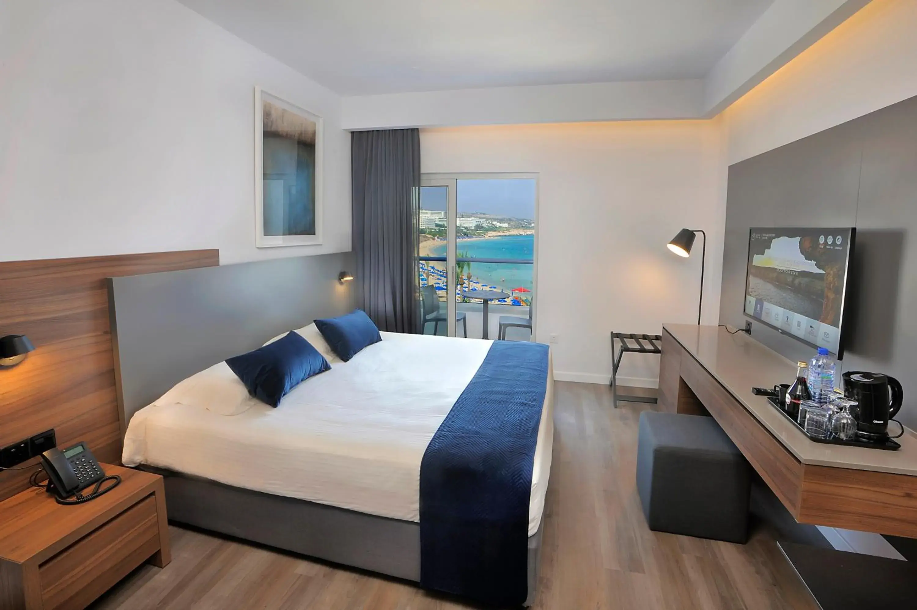 Bed in Okeanos Beach Boutique Hotel