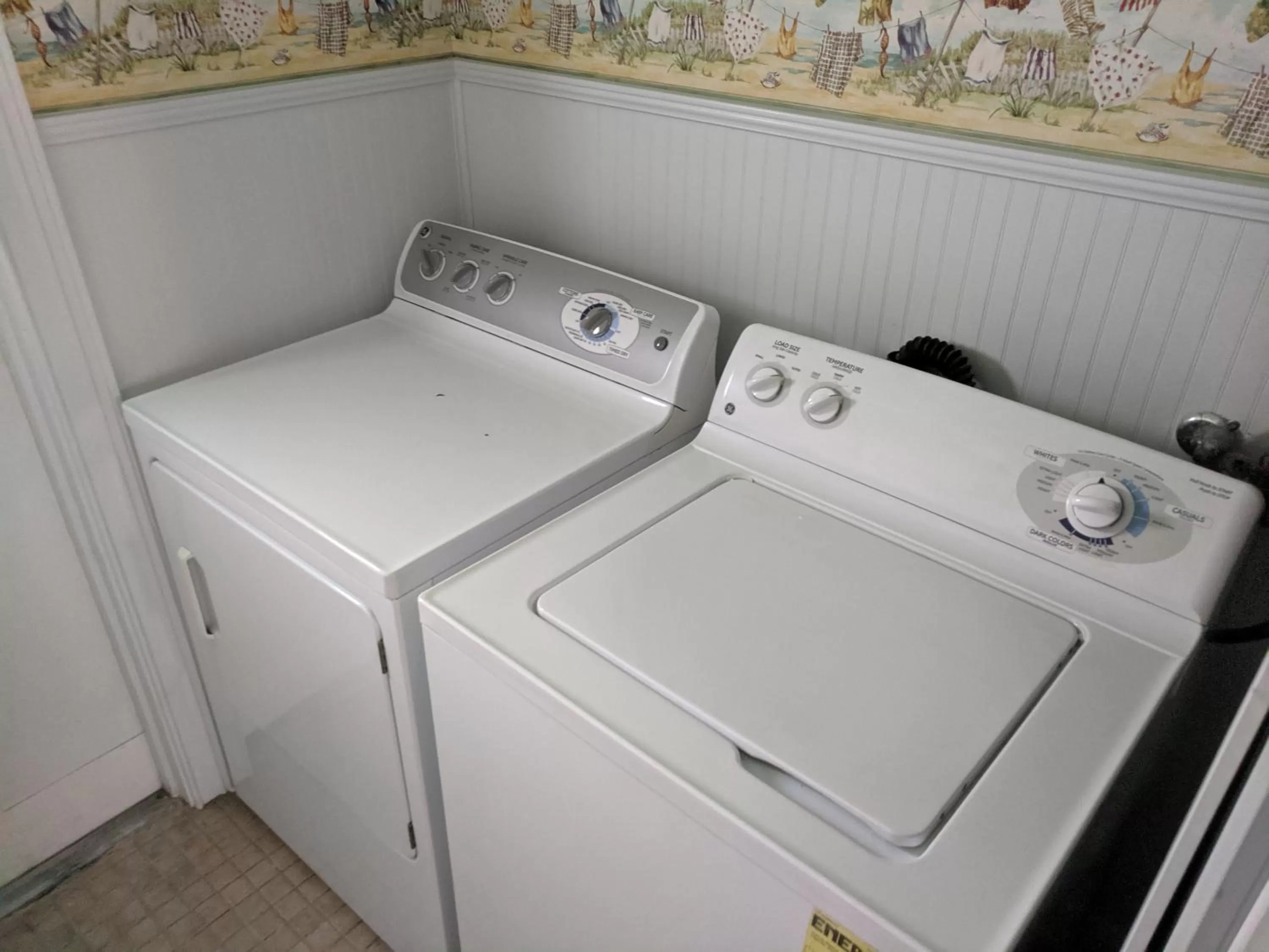 washing machine in Manhattan Tower Apartment Hotel