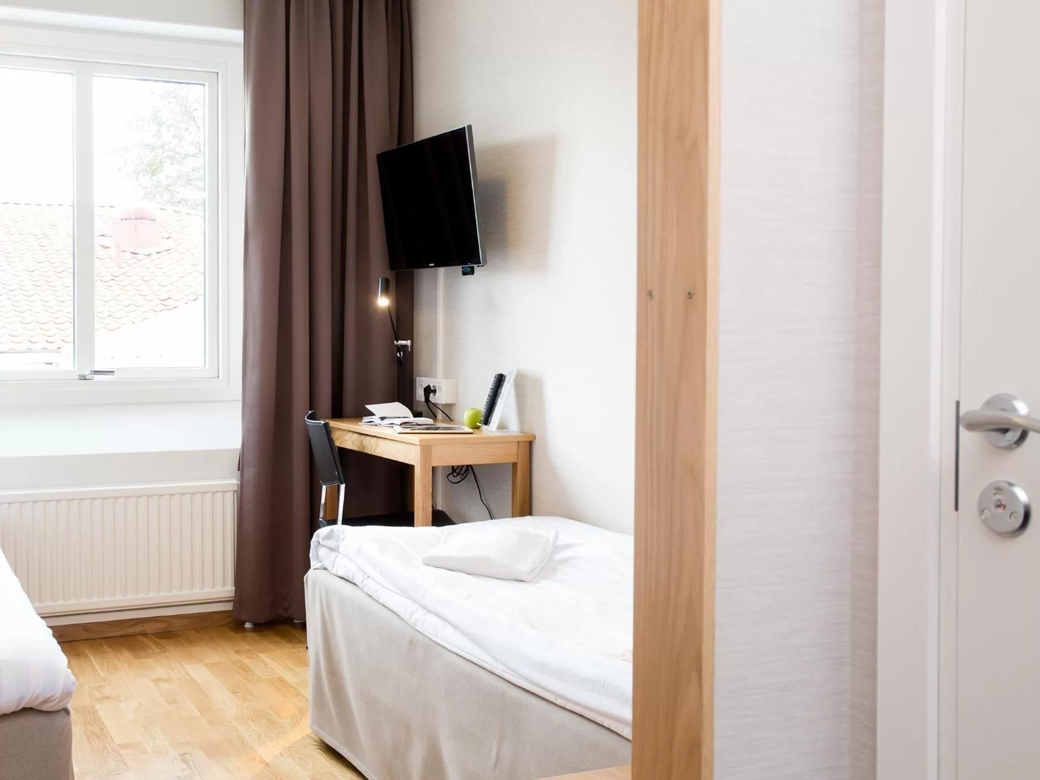 Photo of the whole room, Bed in Hotell Svanen