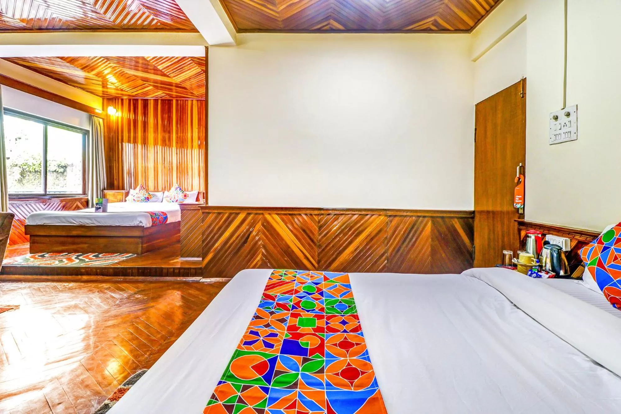 Bedroom in FabHotel Oak Ridge Retreat I