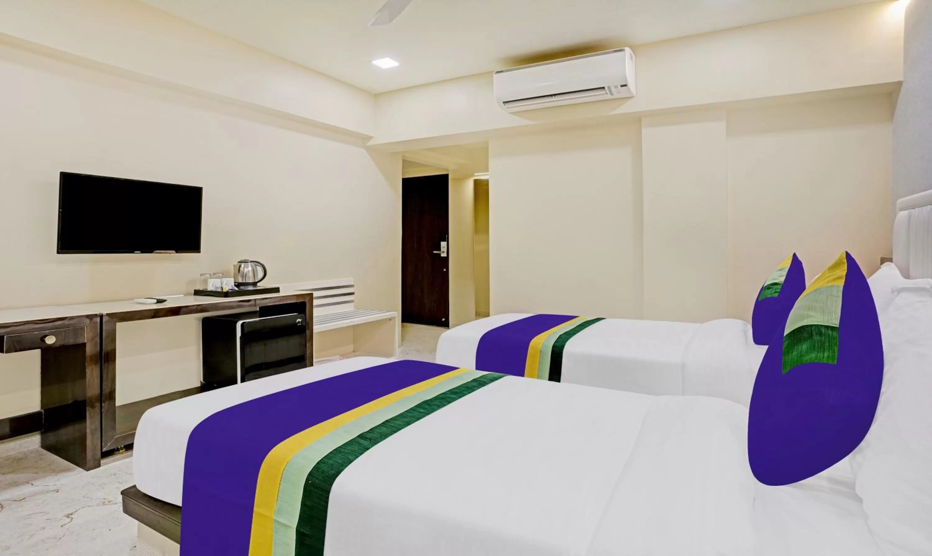 Bedroom, Bed in Treebo Premium Golden Bliss Trimurti Nagar Square