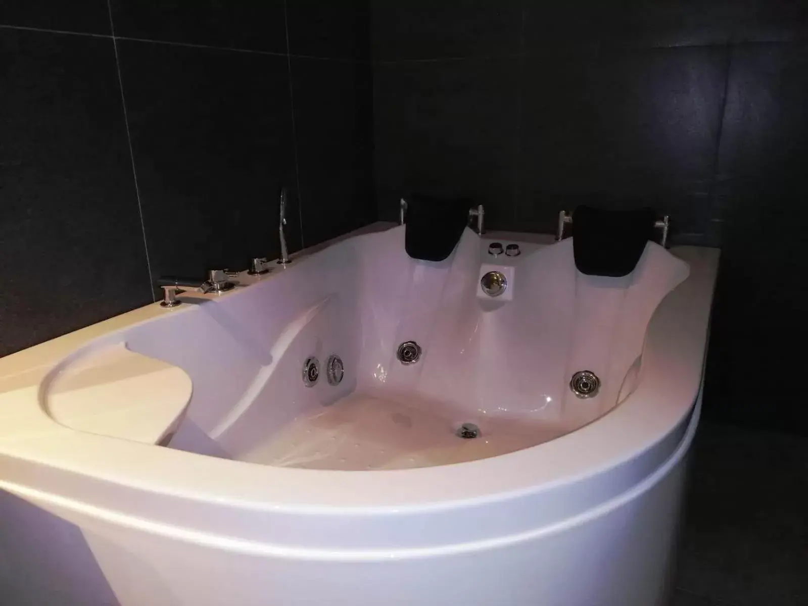 Bathroom in Ramee Palace Hotel