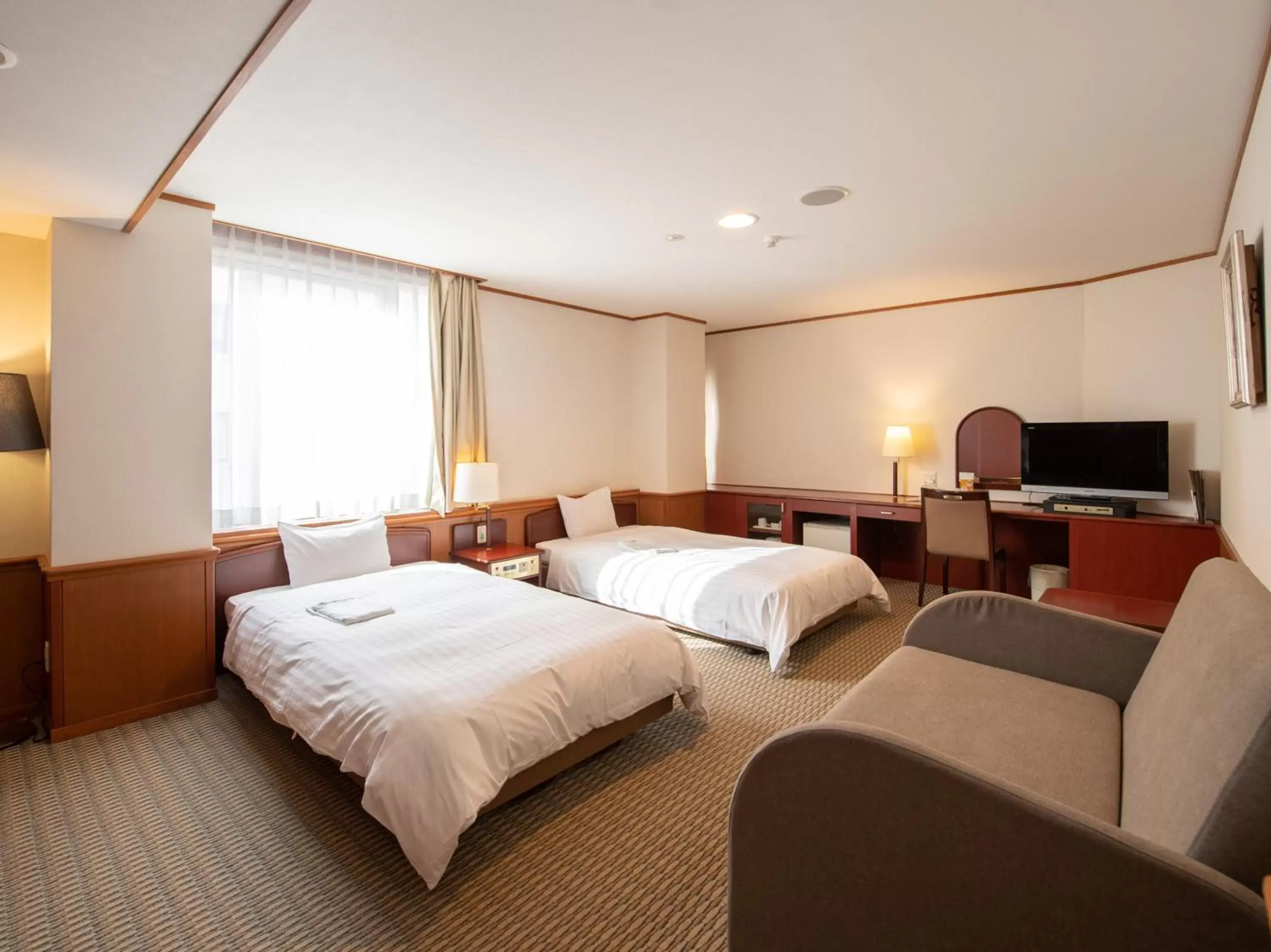 Bed in Hotel Iidaya