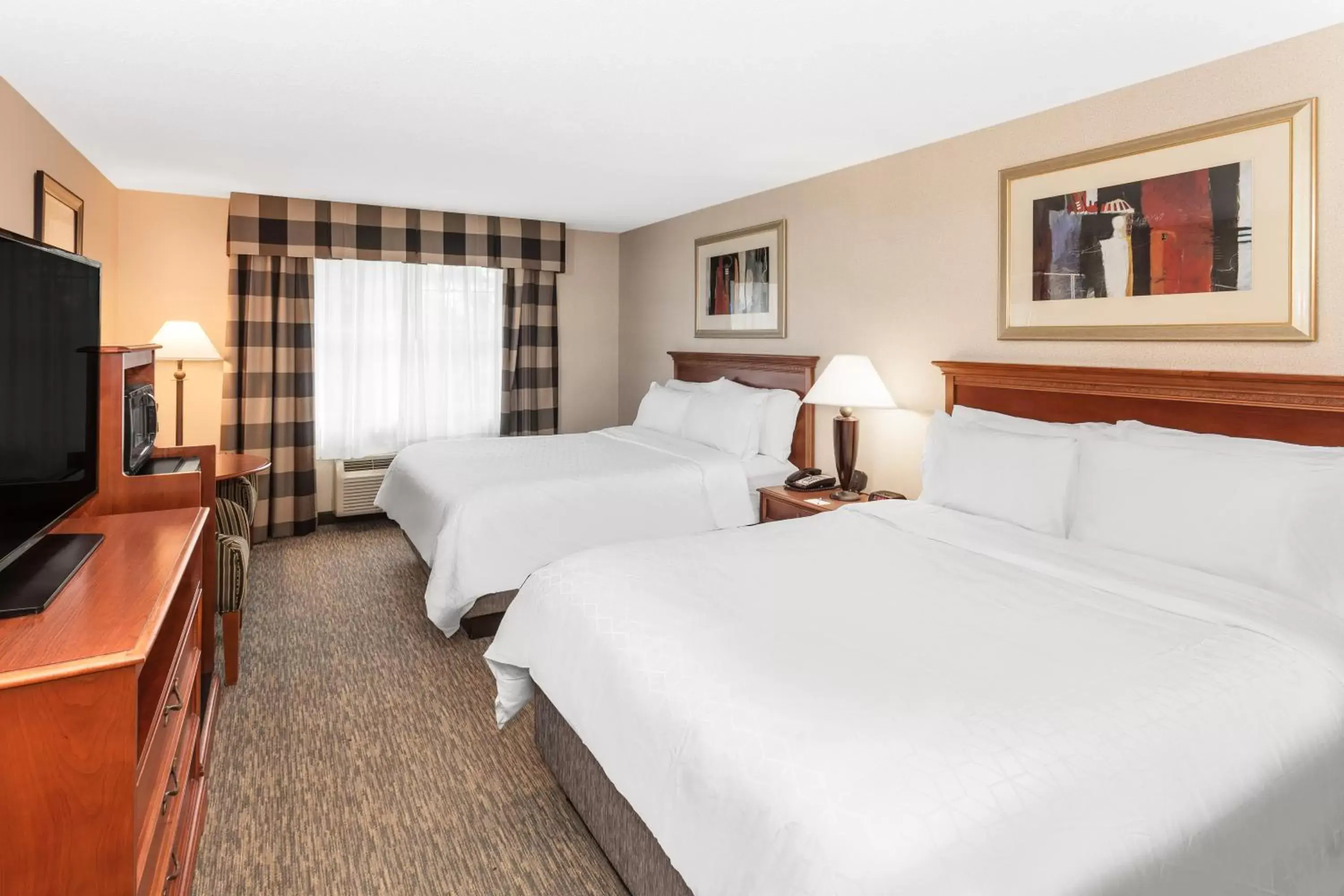 TV and multimedia, Bed in Holiday Inn Express Hotel & Suites Hampton South-Seabrook, an IHG Hotel