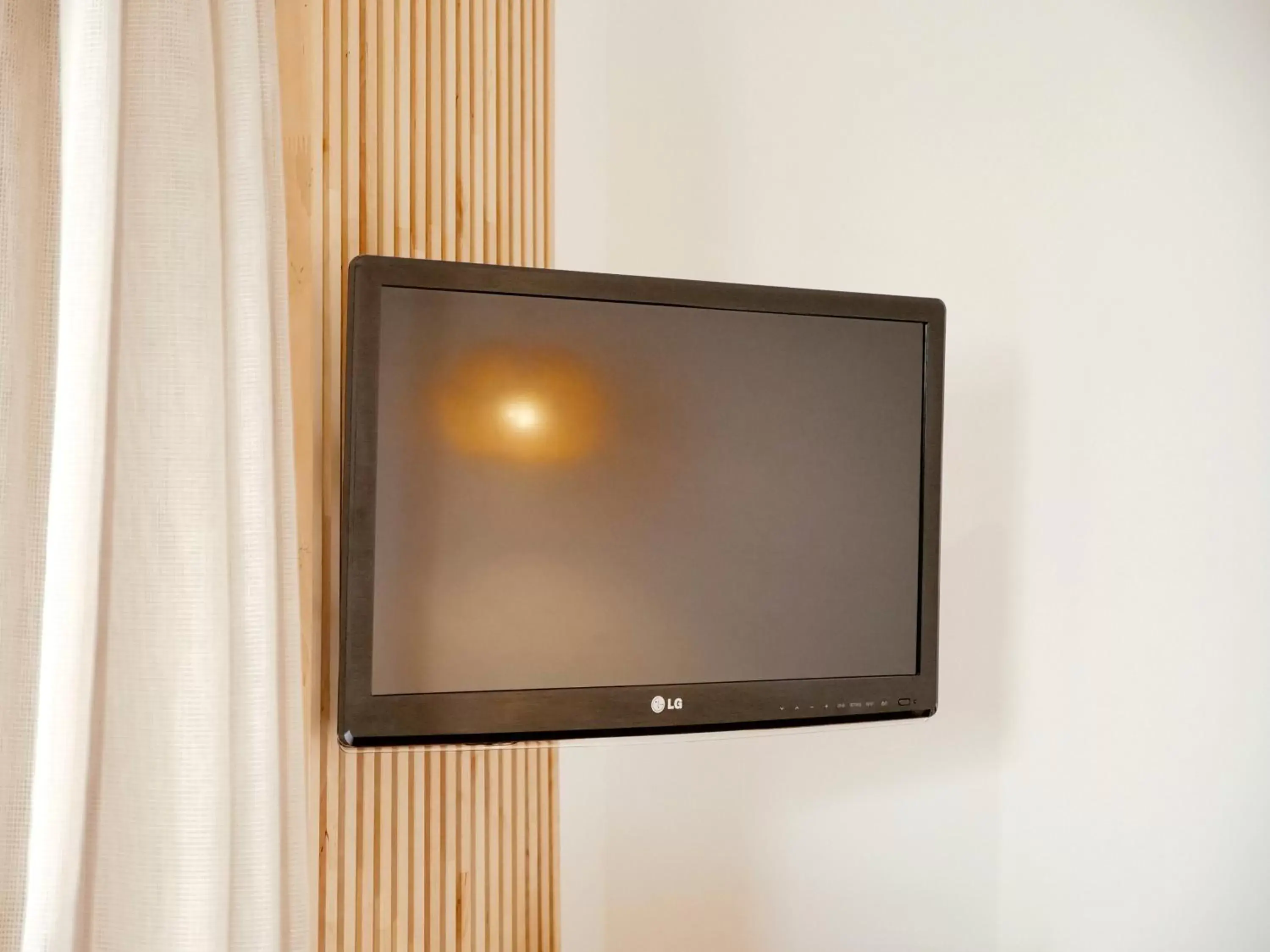 TV and multimedia, TV/Entertainment Center in ECORKHOTEL Evora