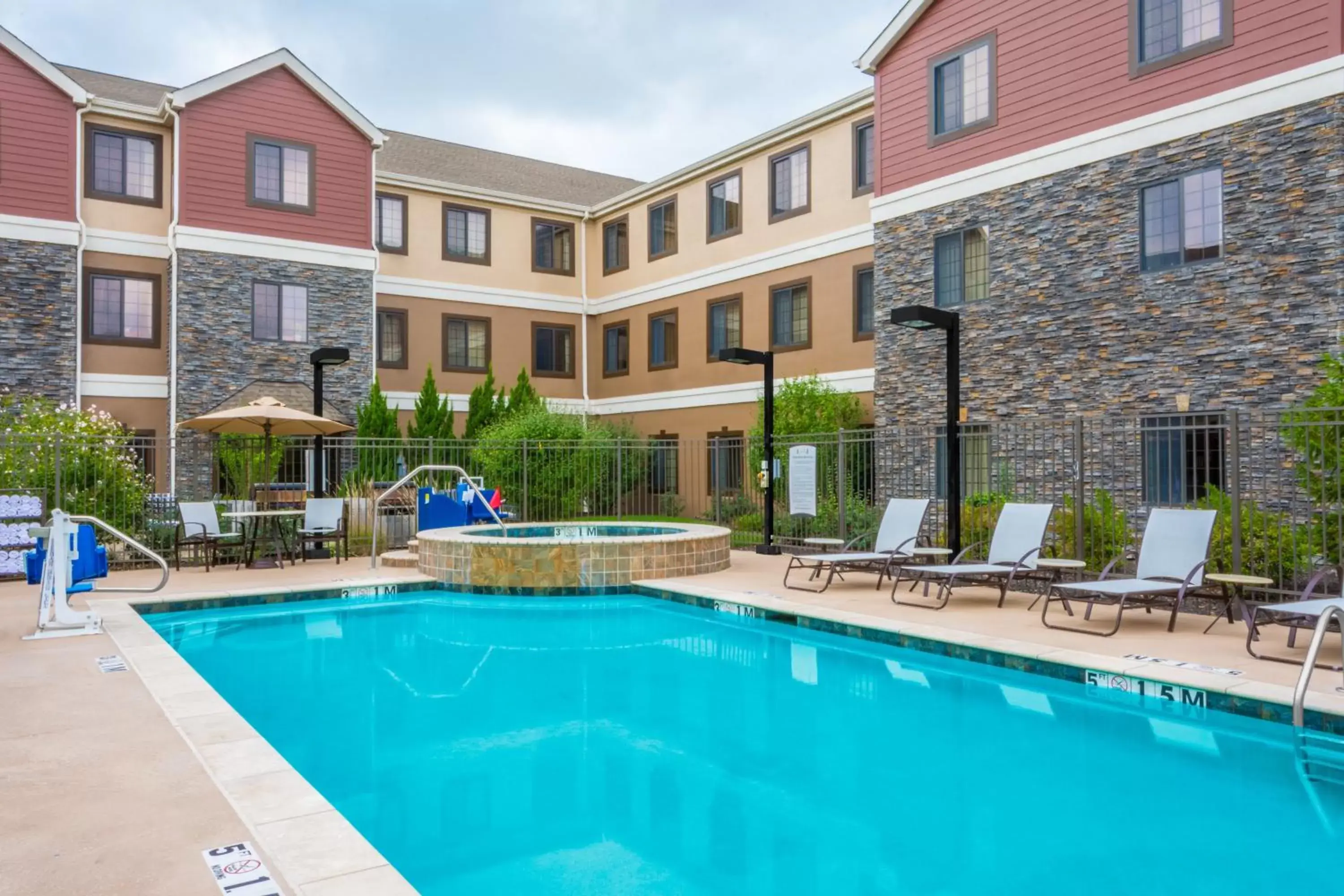 Swimming Pool in Staybridge Suites - Kansas City-Independence, an IHG Hotel