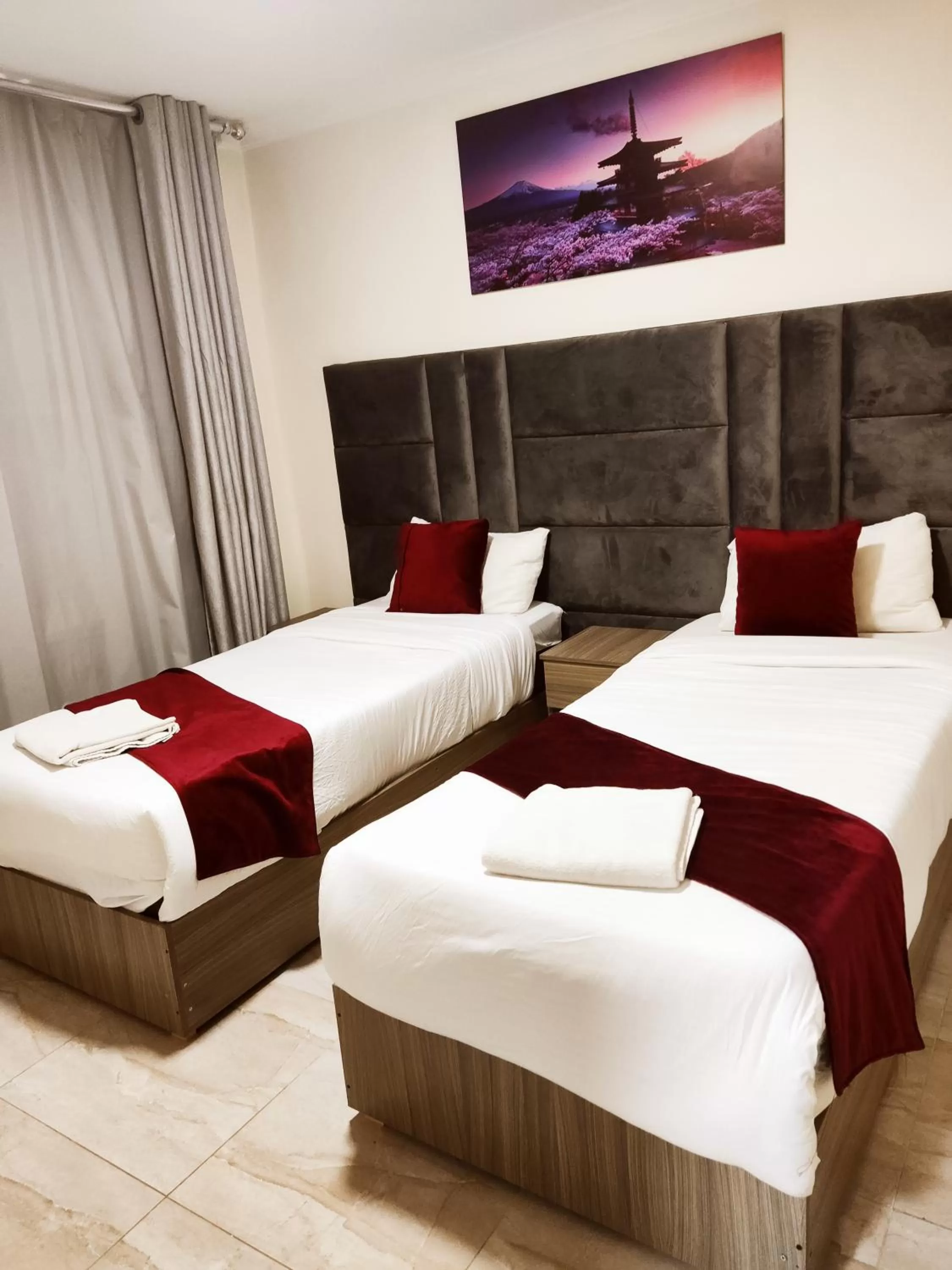 Bed in Golden Plaza Hotel