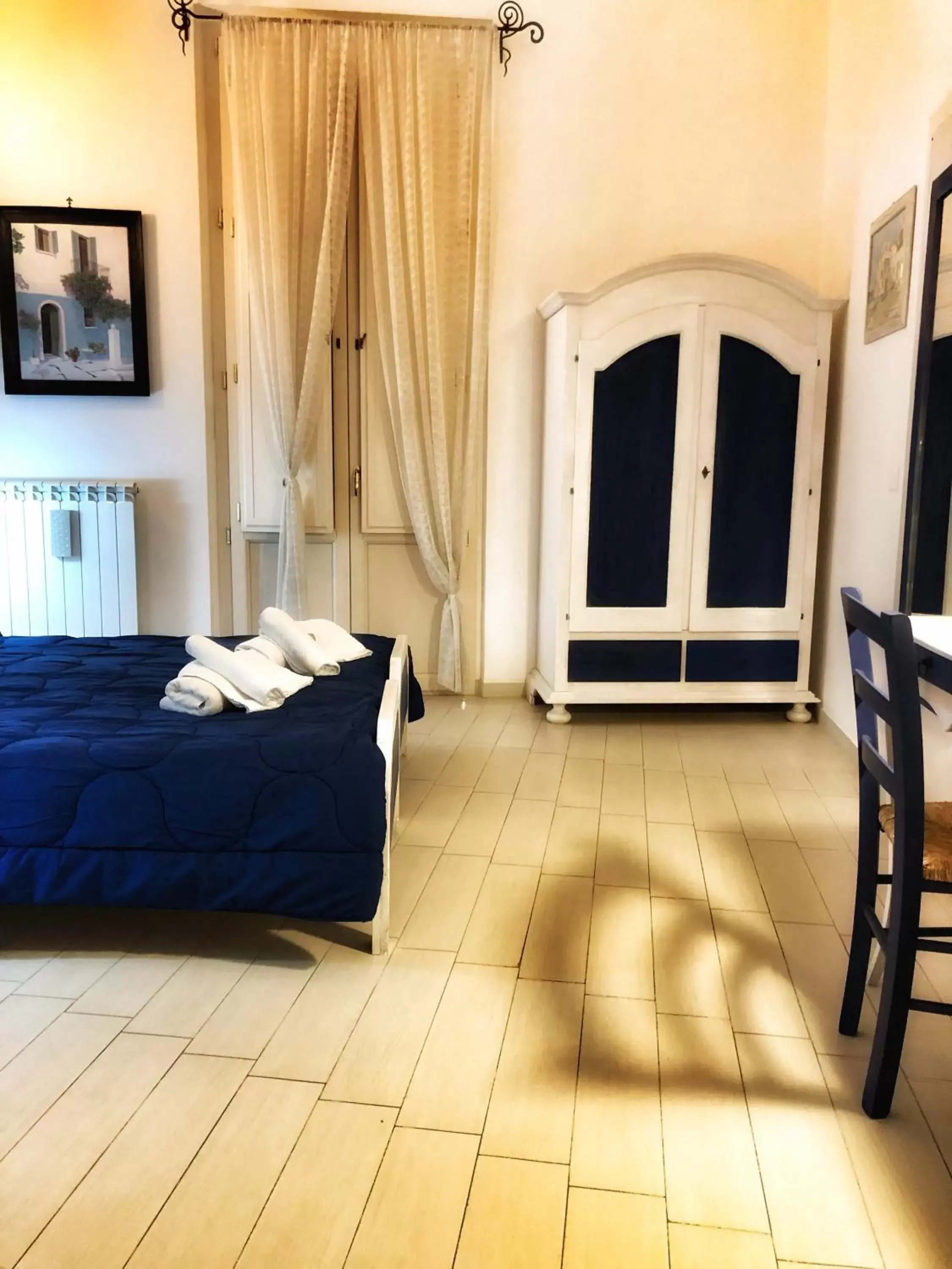 Photo of the whole room, Bed in Palazzo Salìa