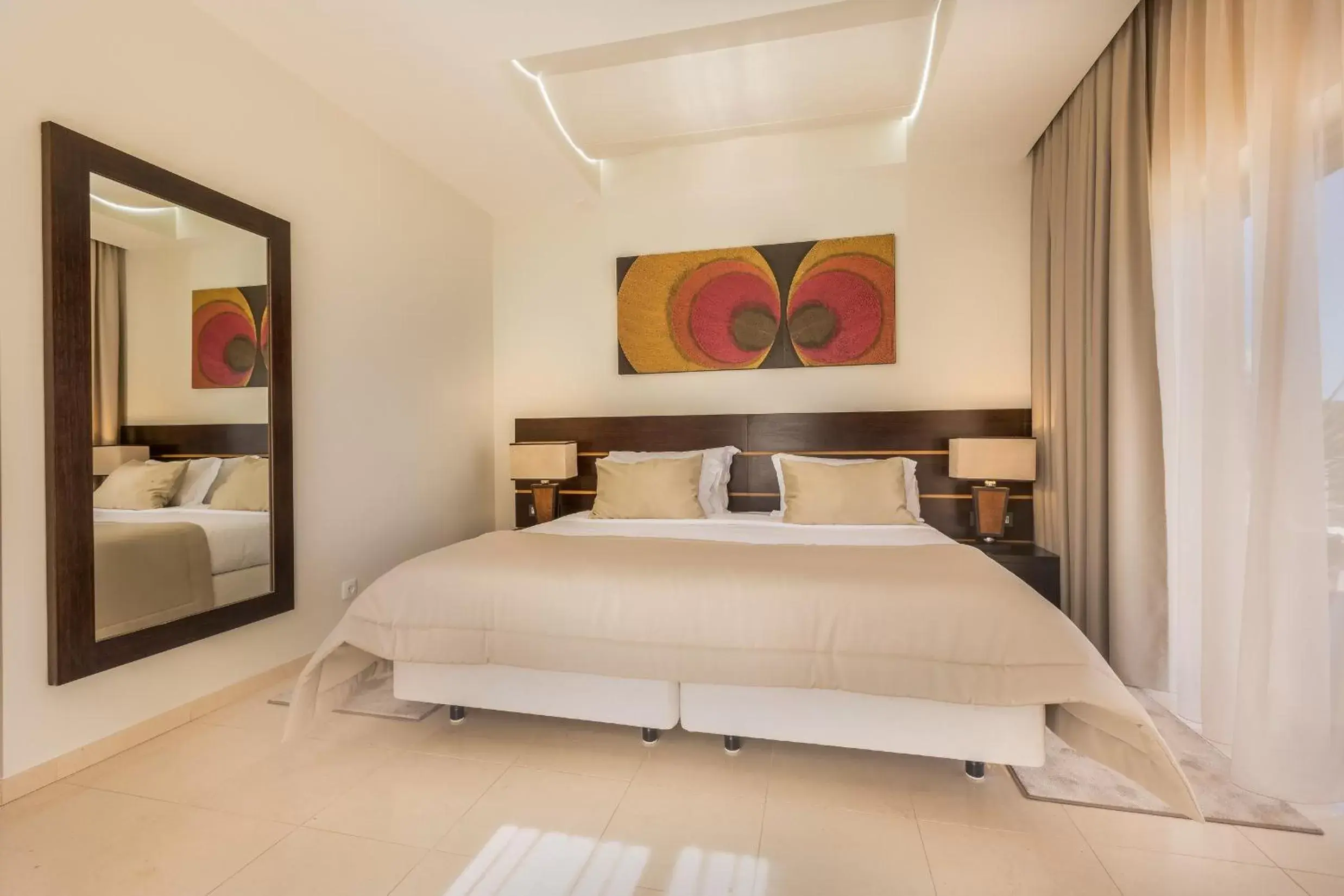 Bed in Caneiros Luxury House & Suites