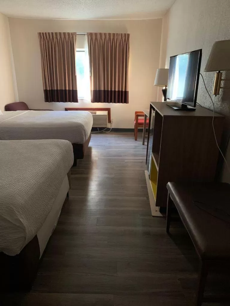 Bed in Days Inn by Wyndham Topeka