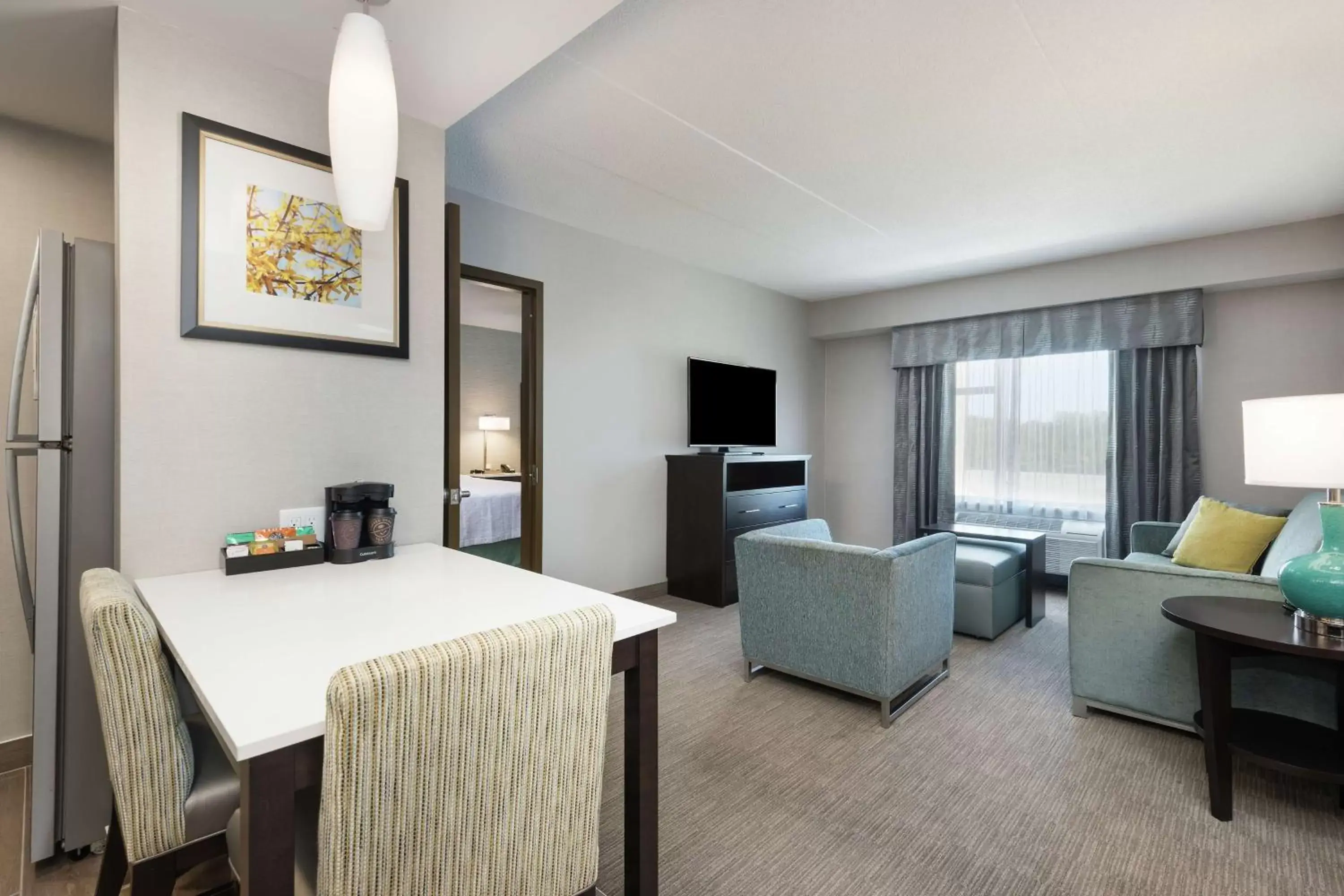 Bedroom, Seating Area in Homewood Suites By Hilton Ottawa Airport