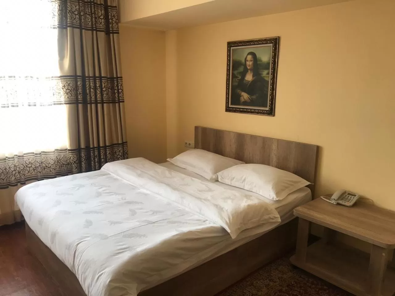 Bed in Altai Business Hotel