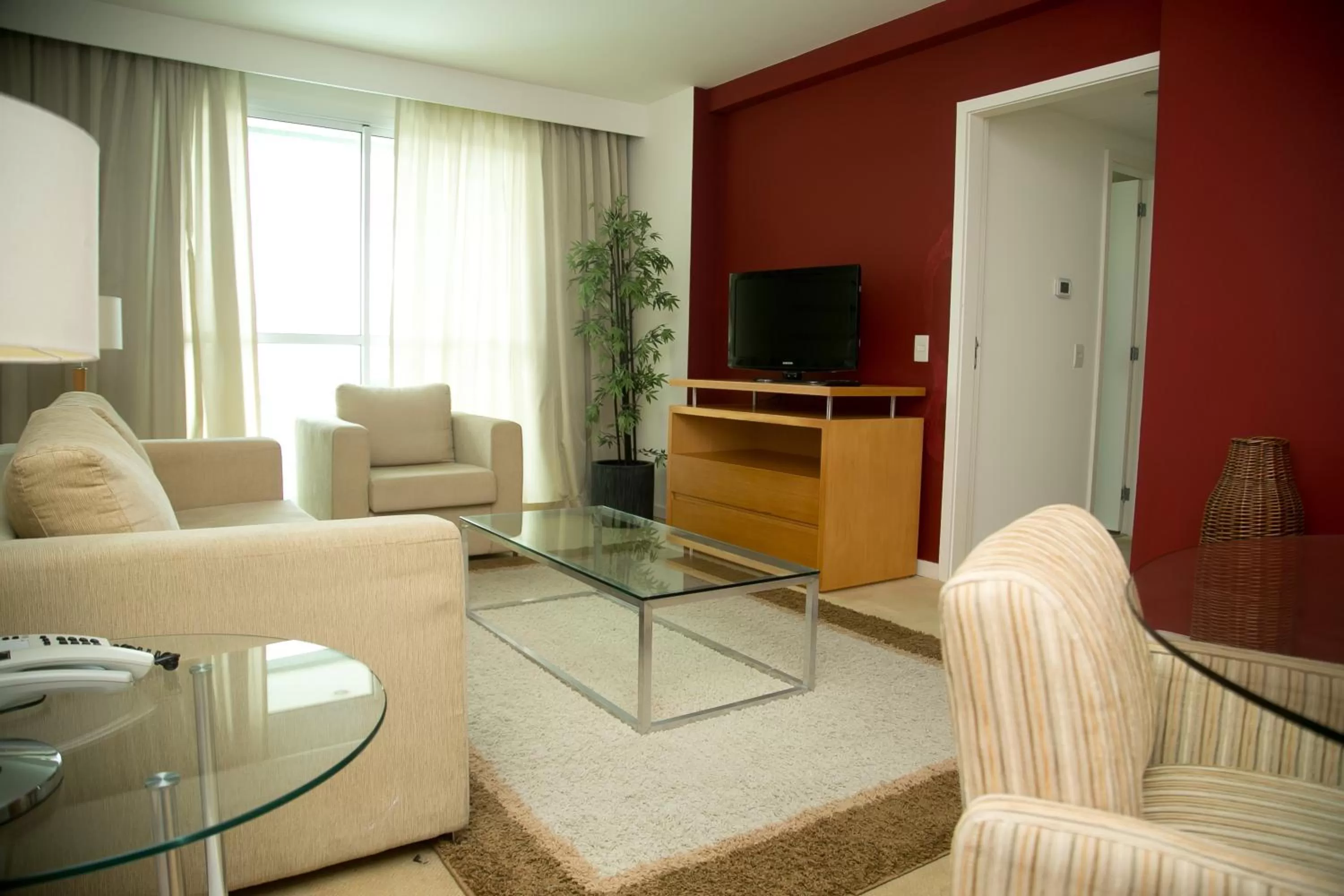 Communal lounge/ TV room in Mercure Macaé