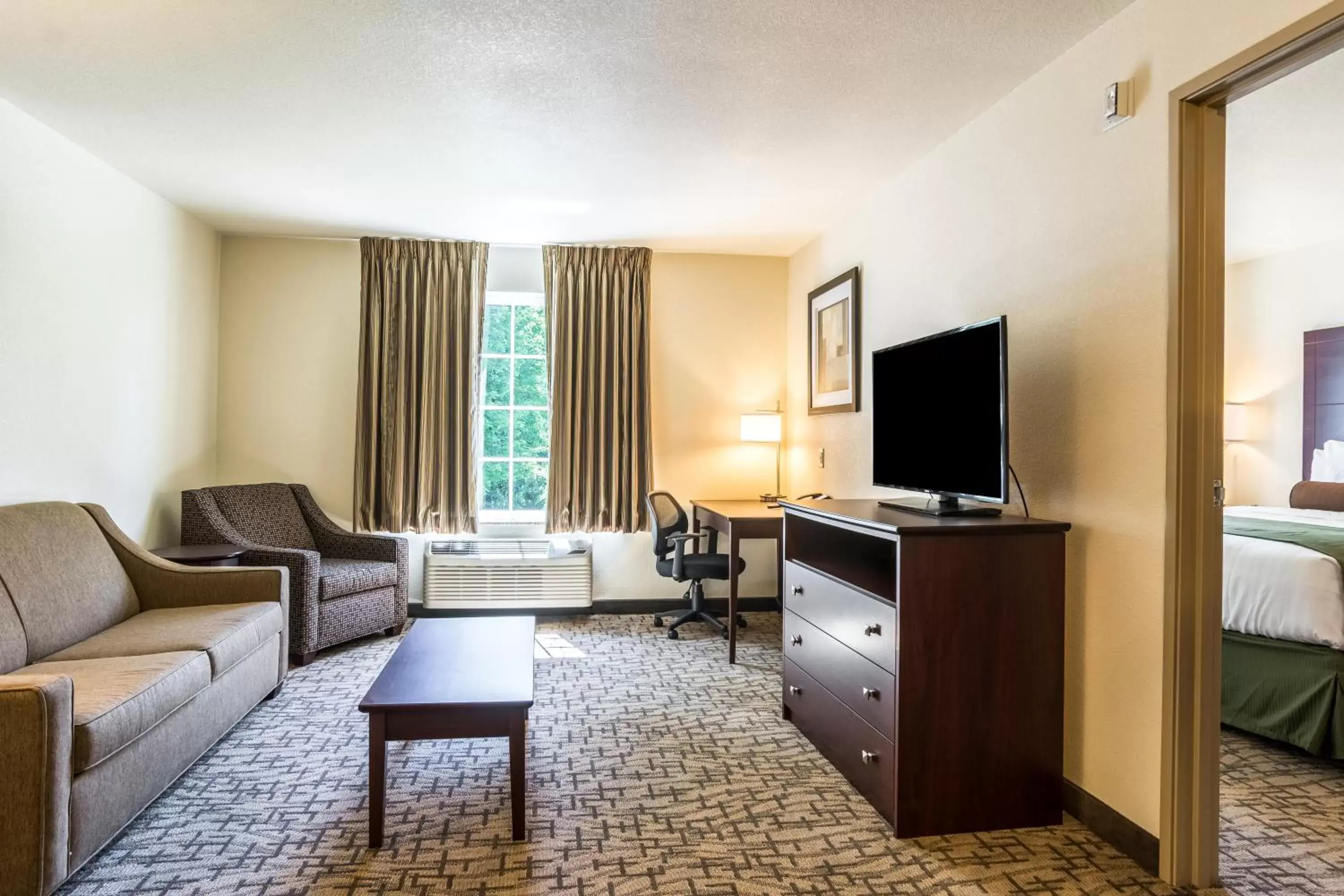 Living room, Seating Area in Cobblestone Hotel & Suites - Greenville