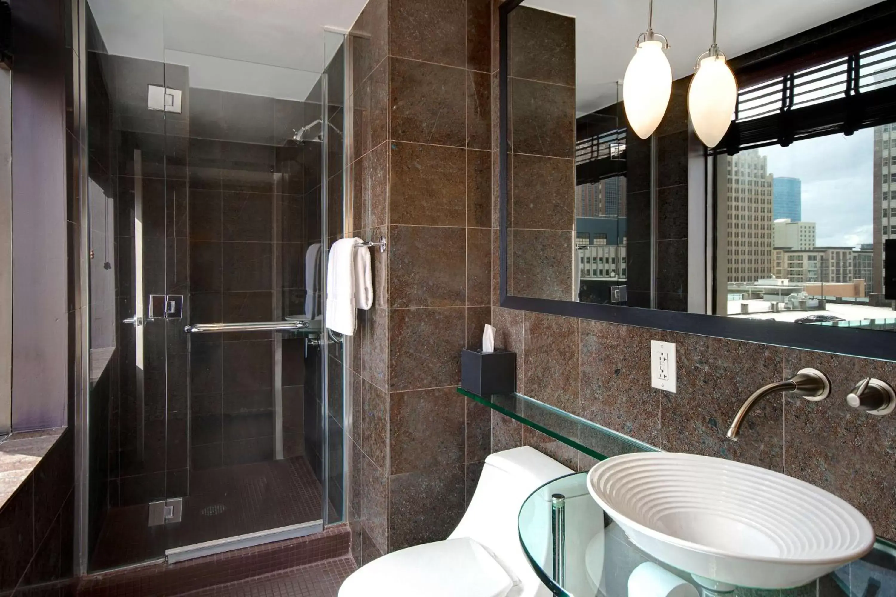Bathroom in The Sam Houston Hotel, Curio Collection by Hilton