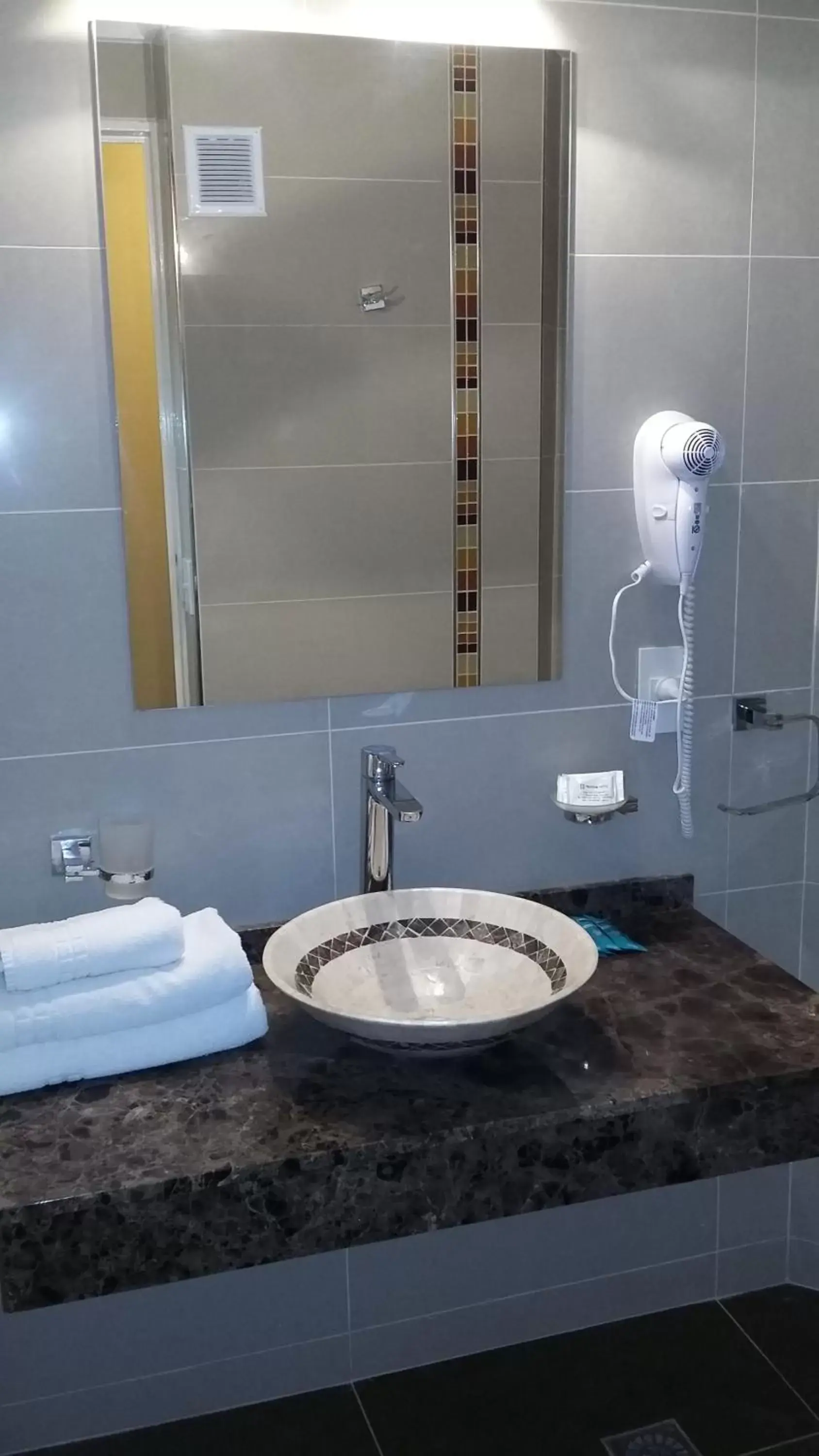 Bathroom in Tritone Hotel