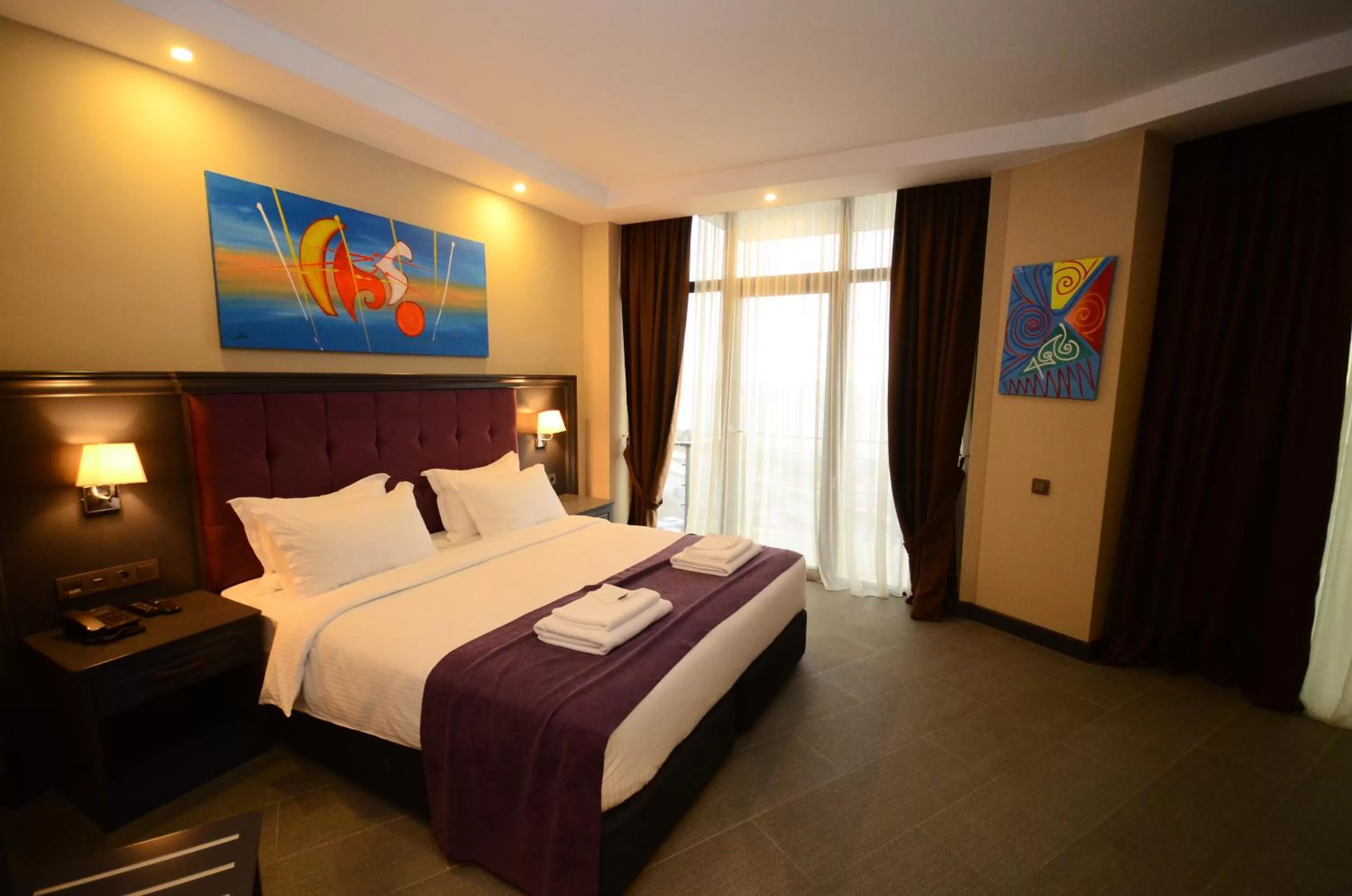 Bed in Batumi Palm Hotel