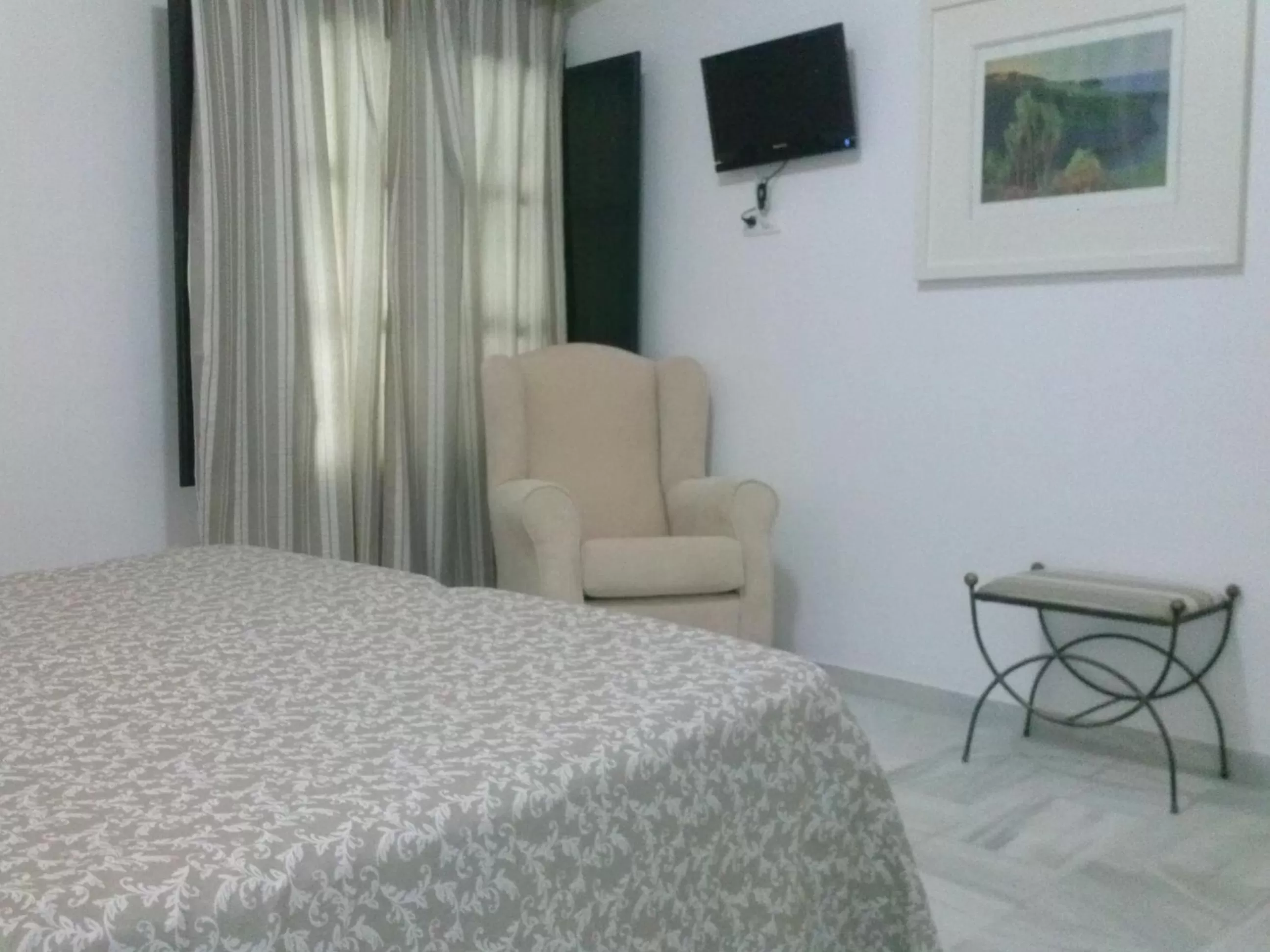 Seating area, Bed in Los Helechos