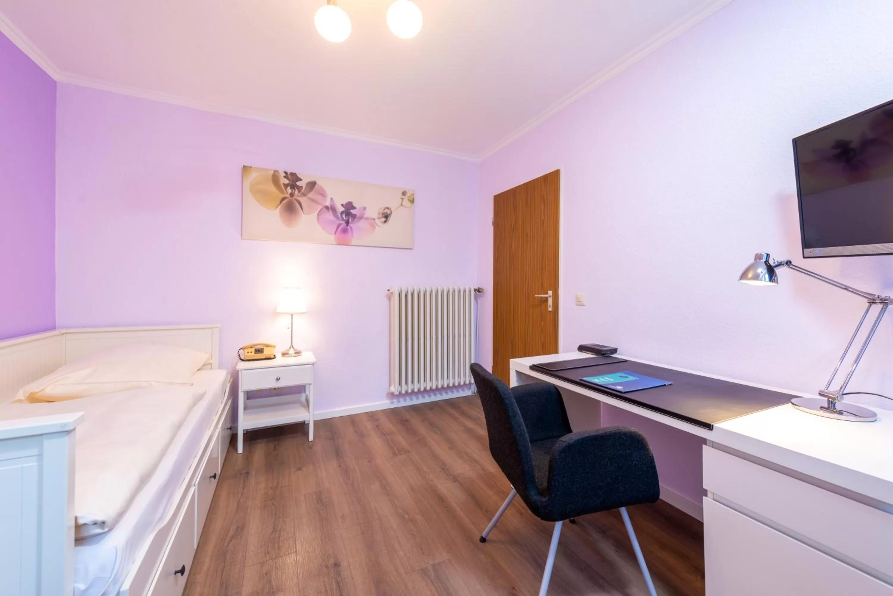 Bed in Hotel Heldt Dependance