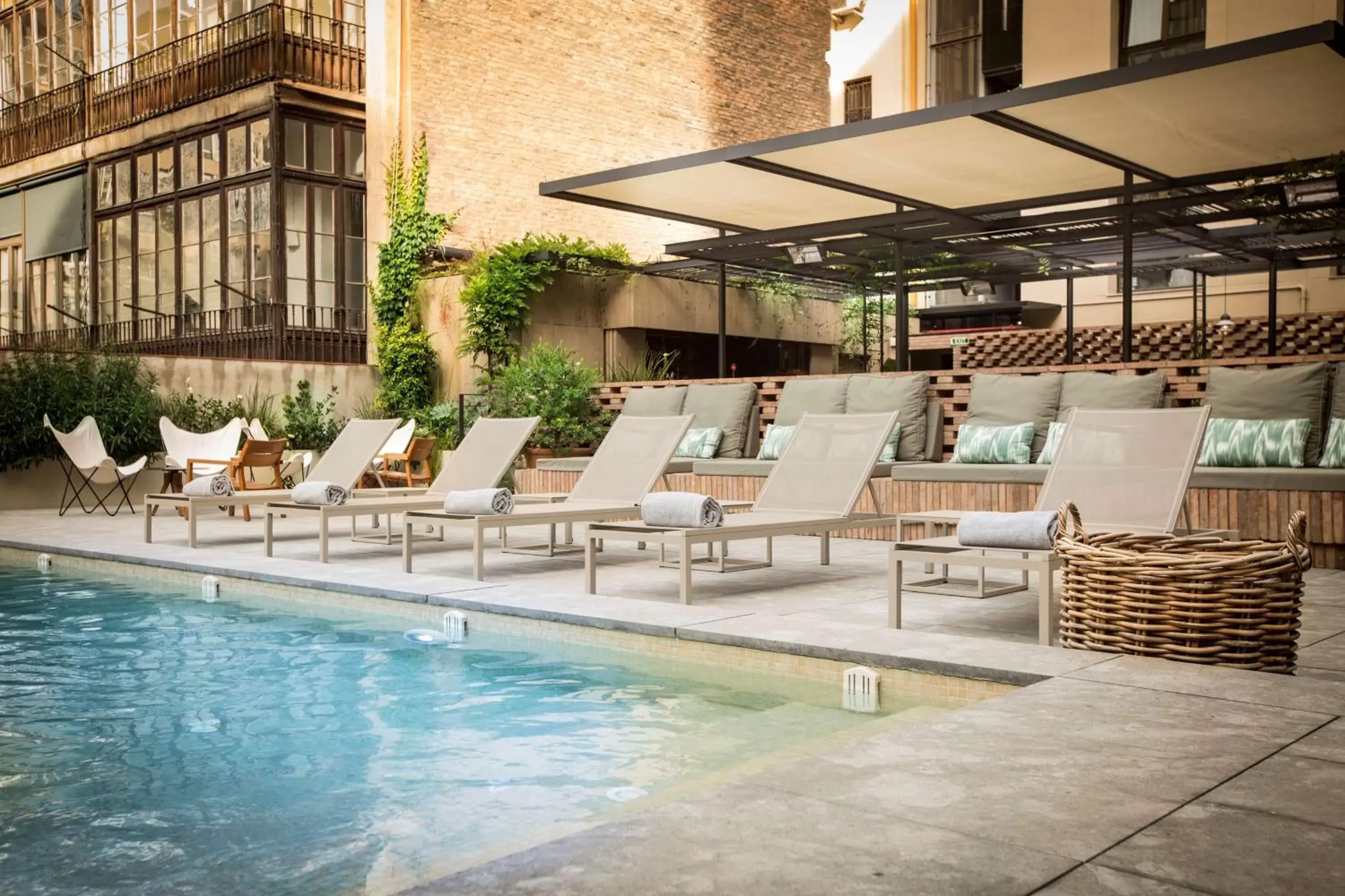 Patio, Swimming Pool in Alexandra Barcelona Hotel, Curio Collection by Hilton