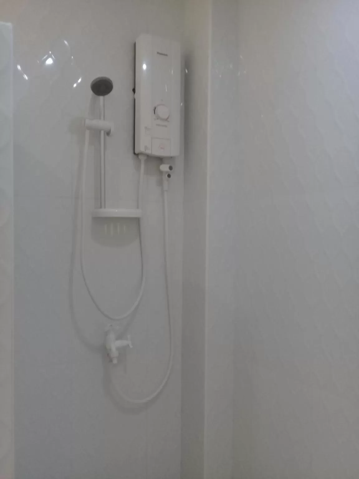 Shower in D & B BLUESTAR BEACH RESORT