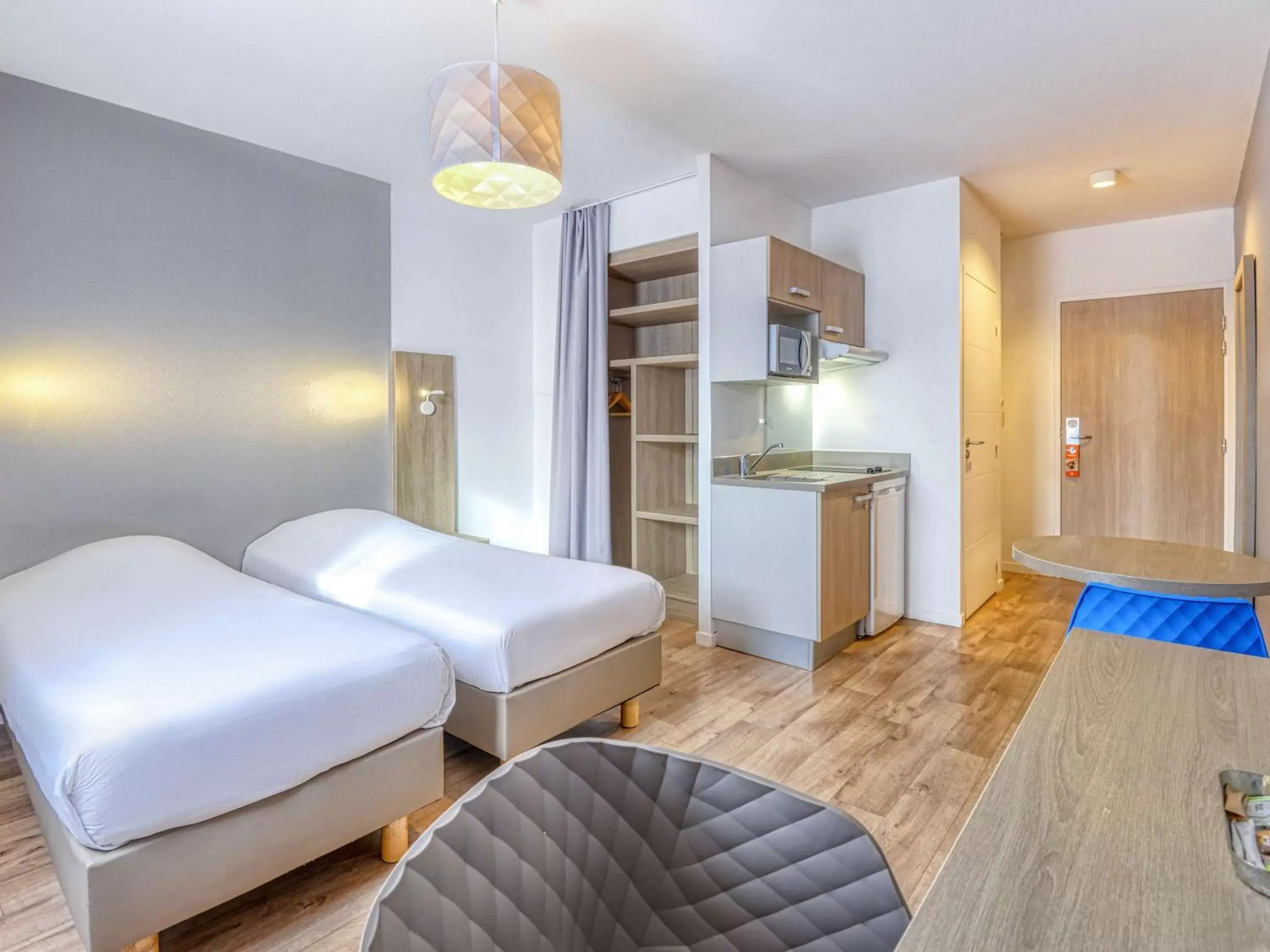Bed in Aparthotel Adagio Access Saint Nazaire